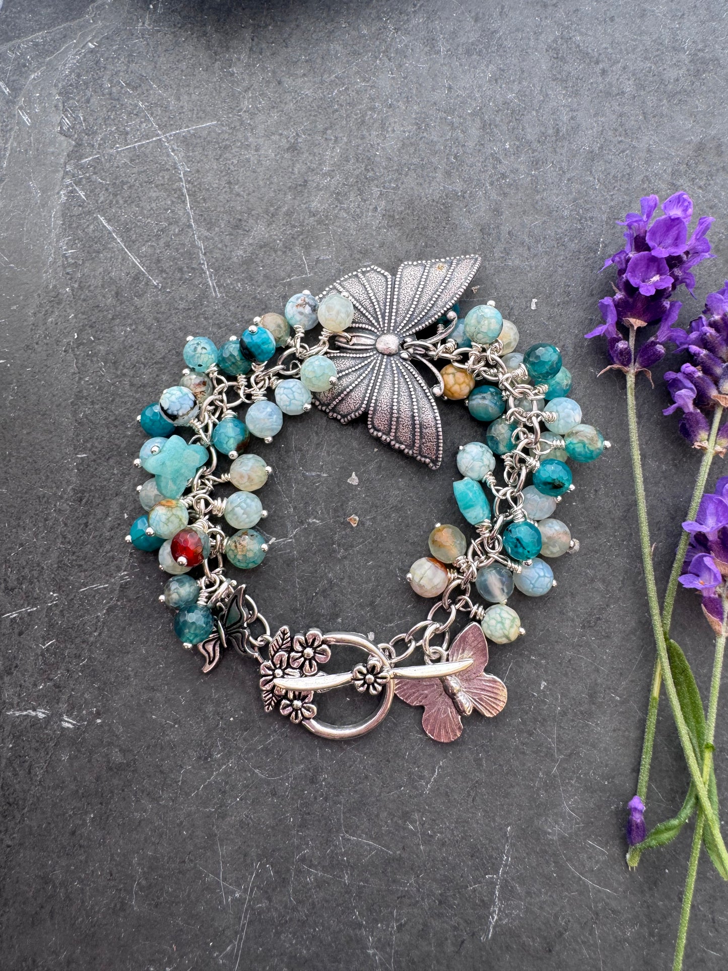 Blue crackled agate stone, butterfly and silver metal bracelet.