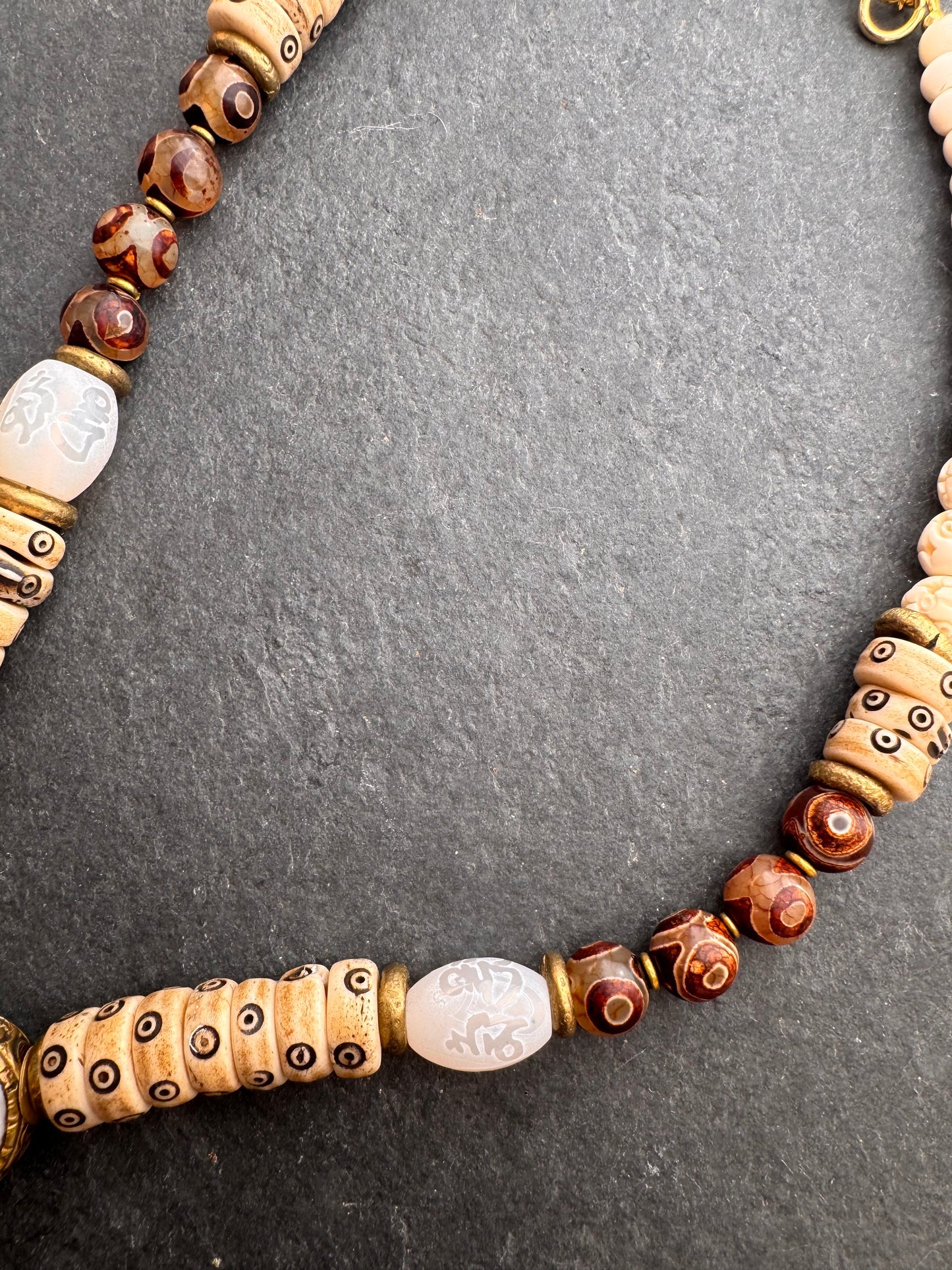 Java glass, African brass, dzi agate, bone, necklace