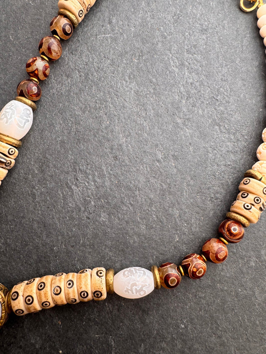 Java glass, African brass, dzi agate, bone, necklace