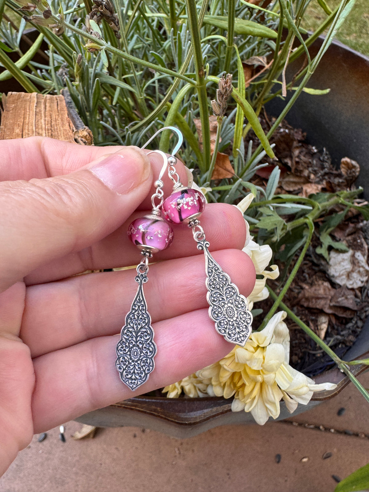 Handmade lampwork glass in pink and black, silver filigree drop, earrings.