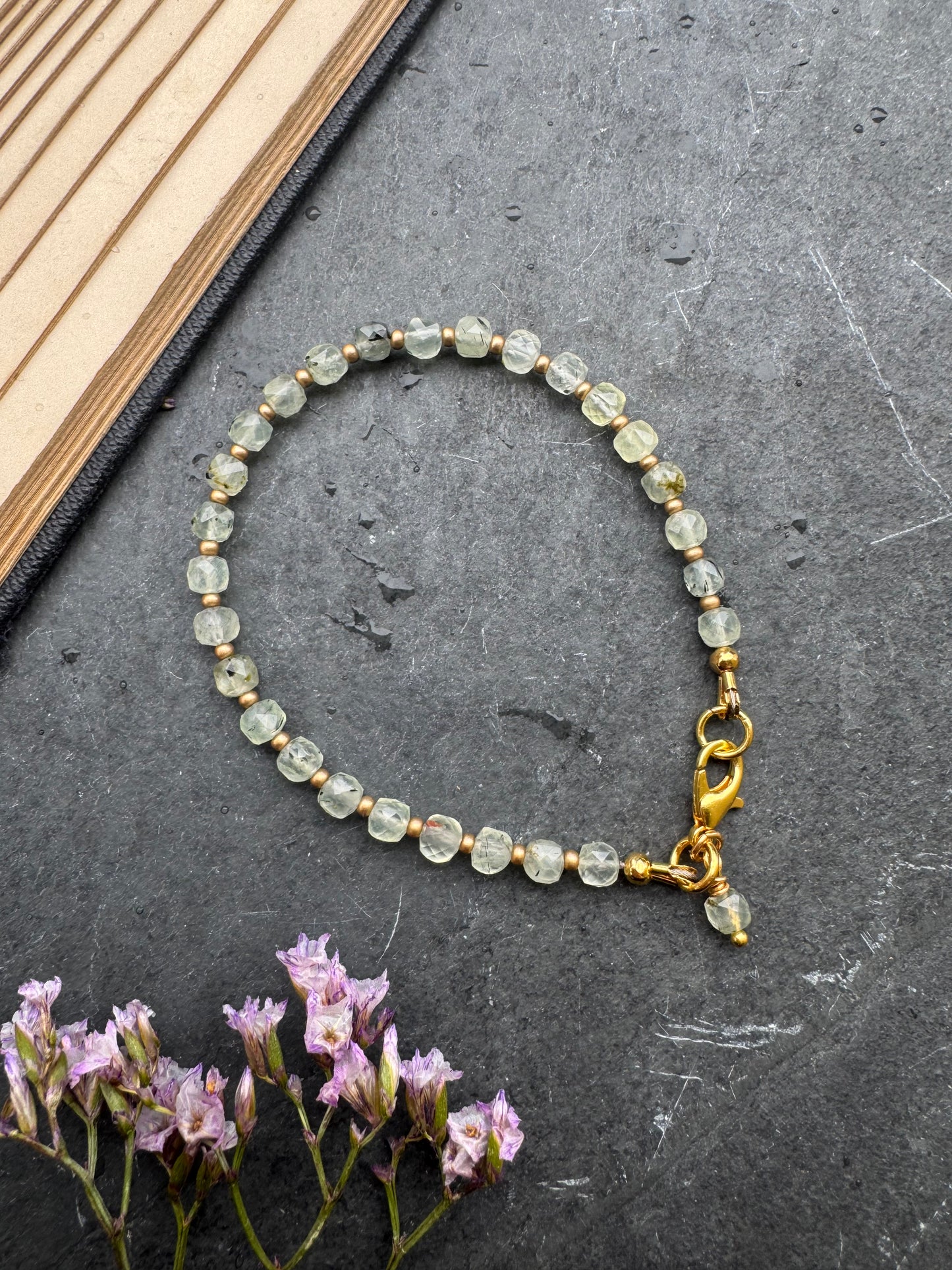 Labradorite faceted round stone, gold metal, bracelet