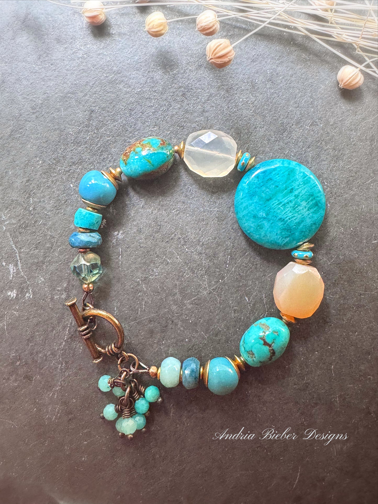 Turquoise, chalcedony, ceramic rounds, apatite stone and African brass bracelet.
