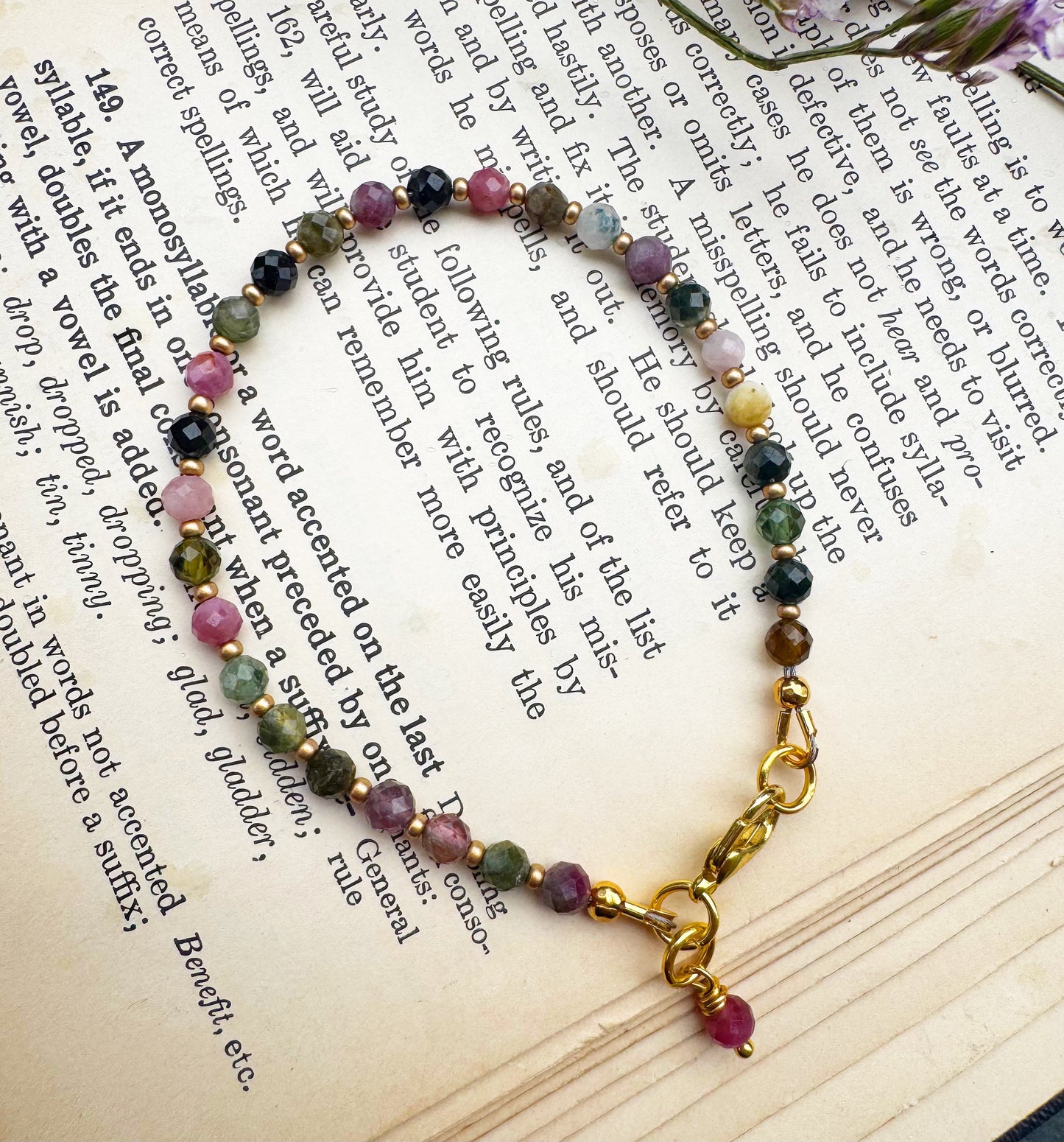Watermelon tourmaline faceted round stone, gold metal, bracelet