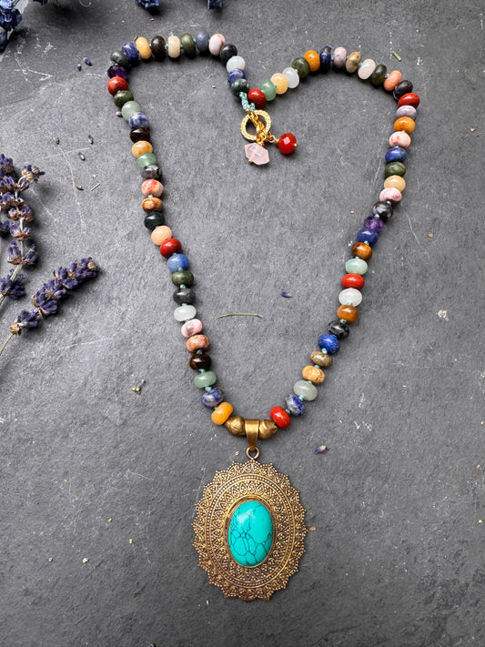 Mixed stone, knotted, brass metal and turquoise stone pendant, necklace
