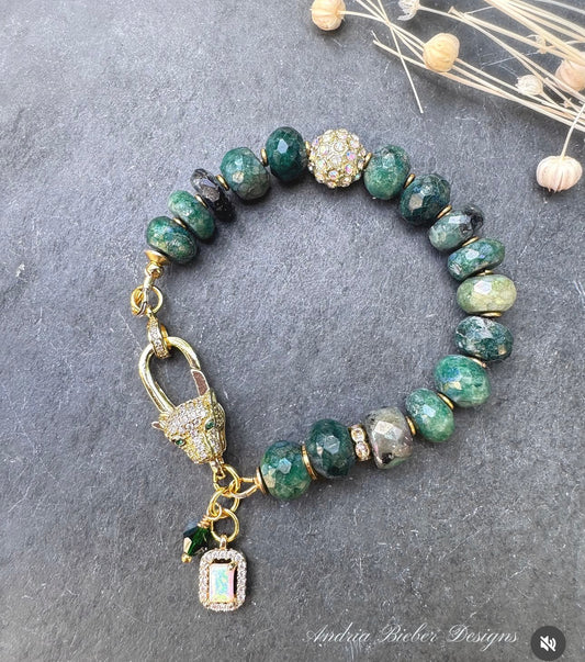 Emerald faceted stone-AB coating, jaguar gold rhinestone clasp.
