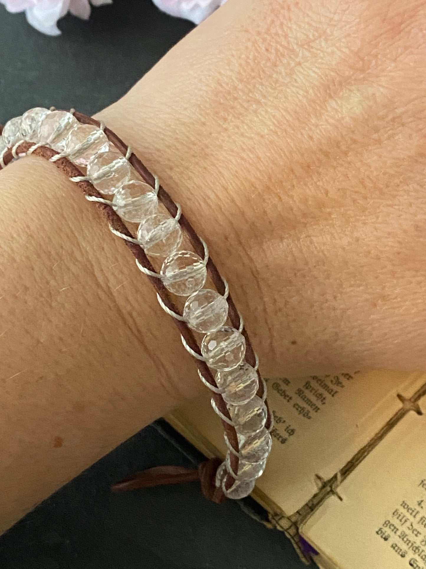 Faceted clear quartz stone, leather ladder bracelet with silver button