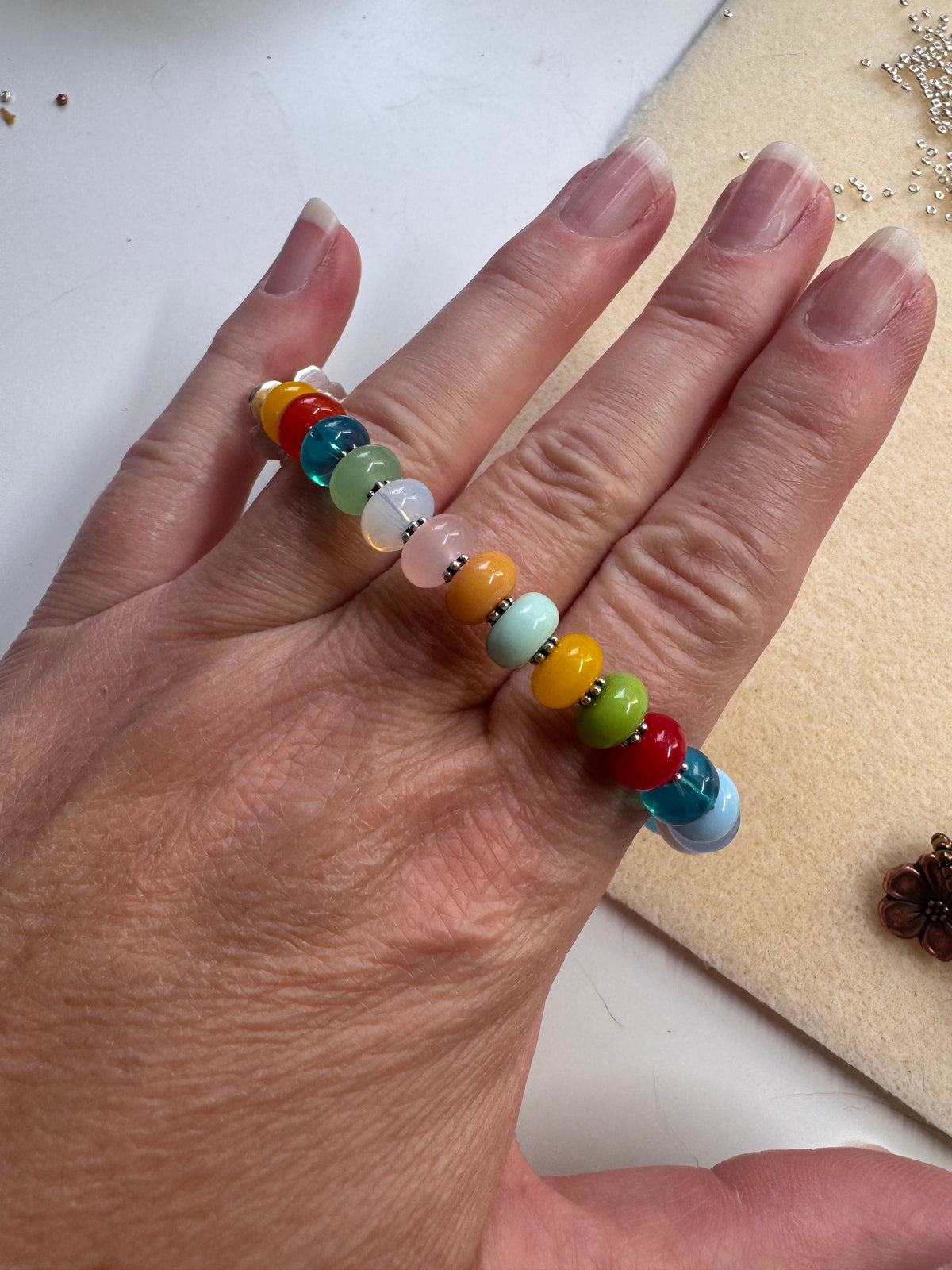 Multi glass, button, silver metal, bracelet.