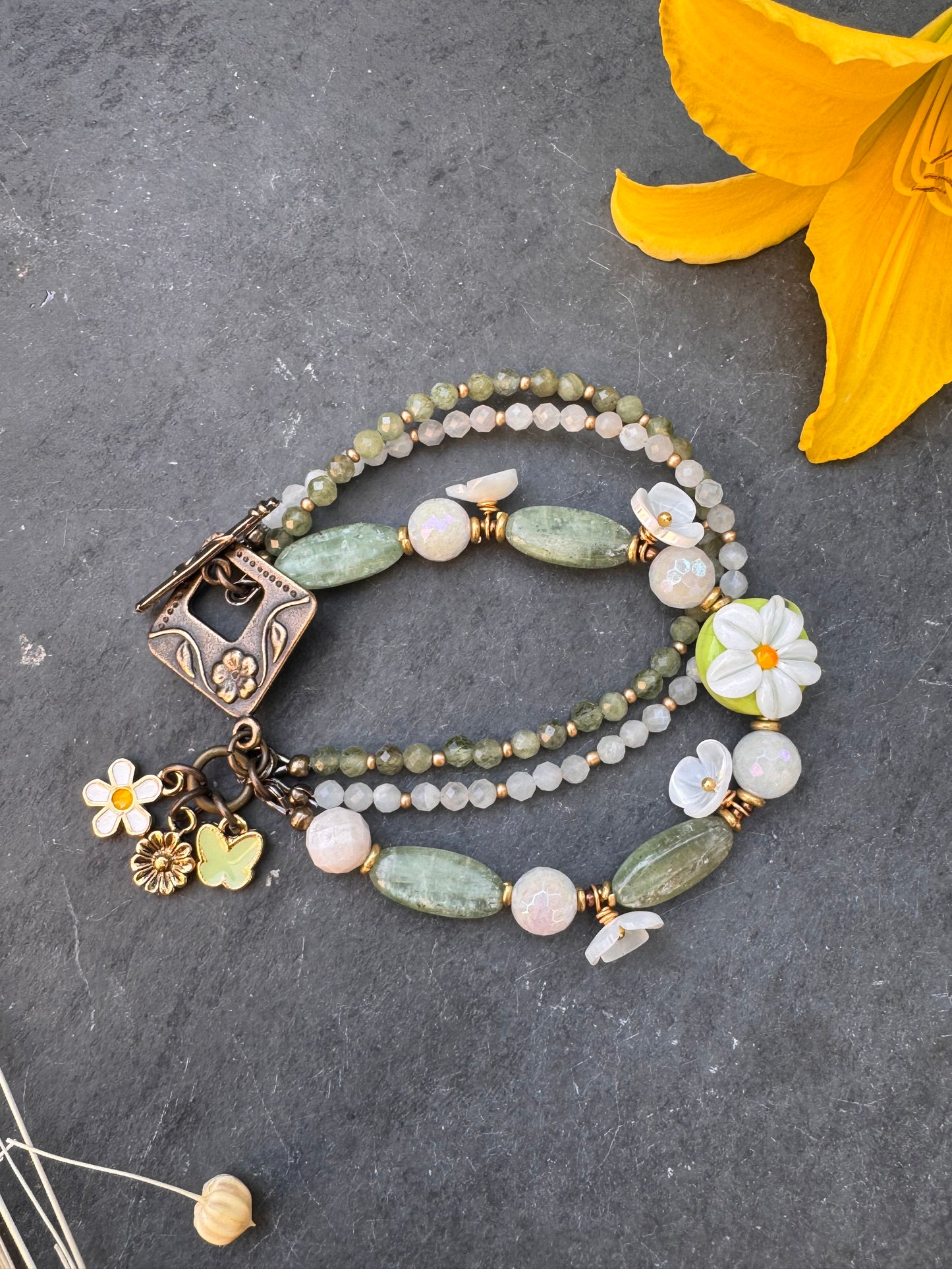 White daisy. Handmade lampwork glass, shell flowers, kyanite, moonstone, bronze metal, bracelet
