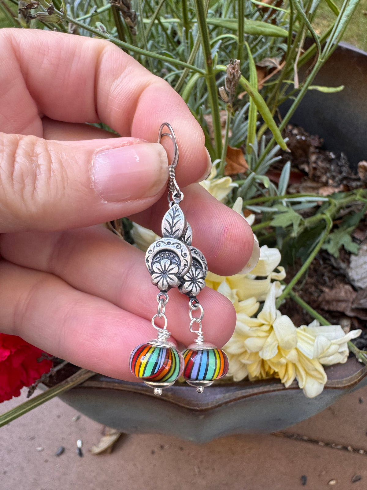 Handmade lampwork glass in rainbows, silver filigree drop, earrings.