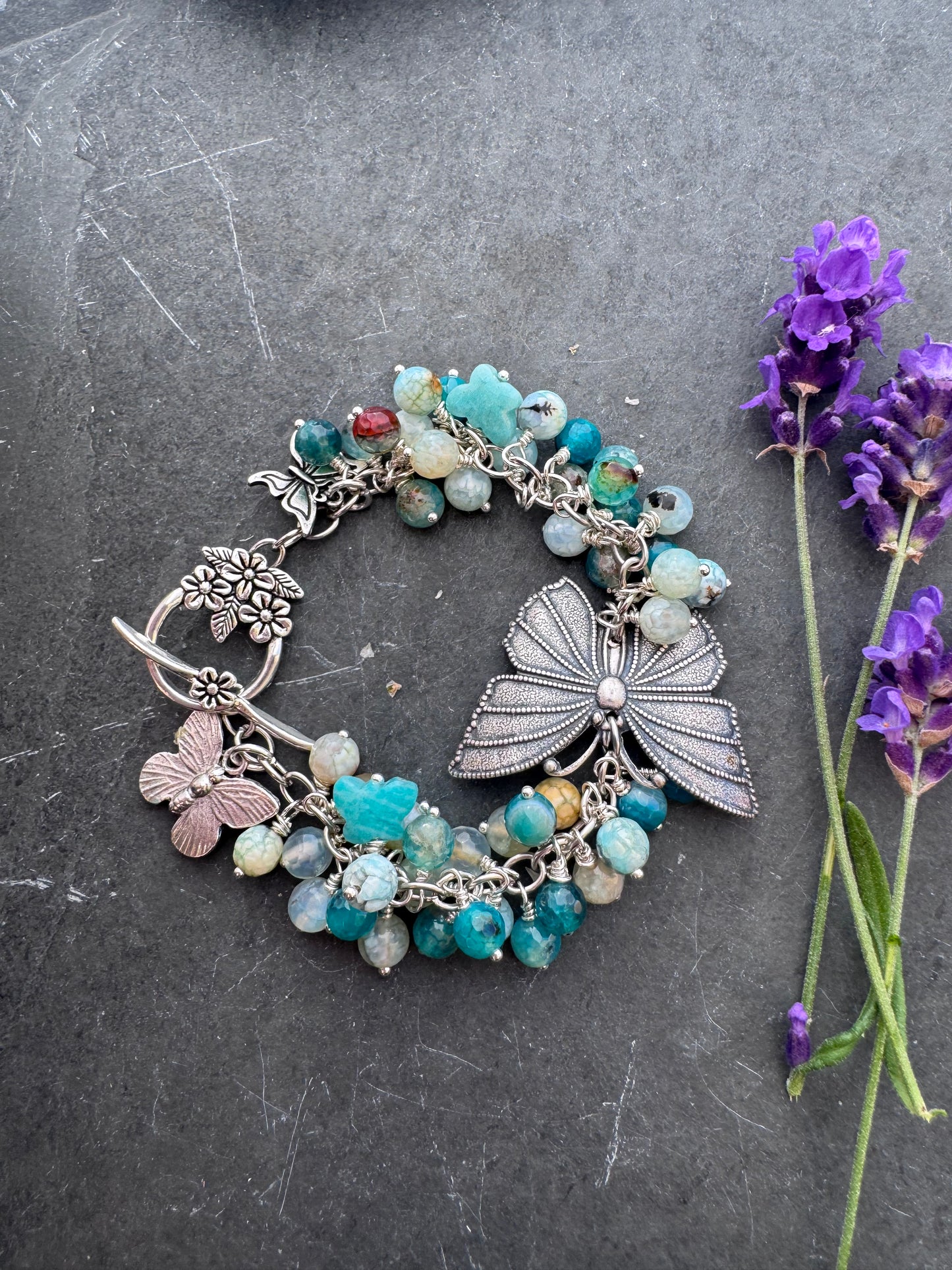 Blue crackled agate stone, butterfly and silver metal bracelet.