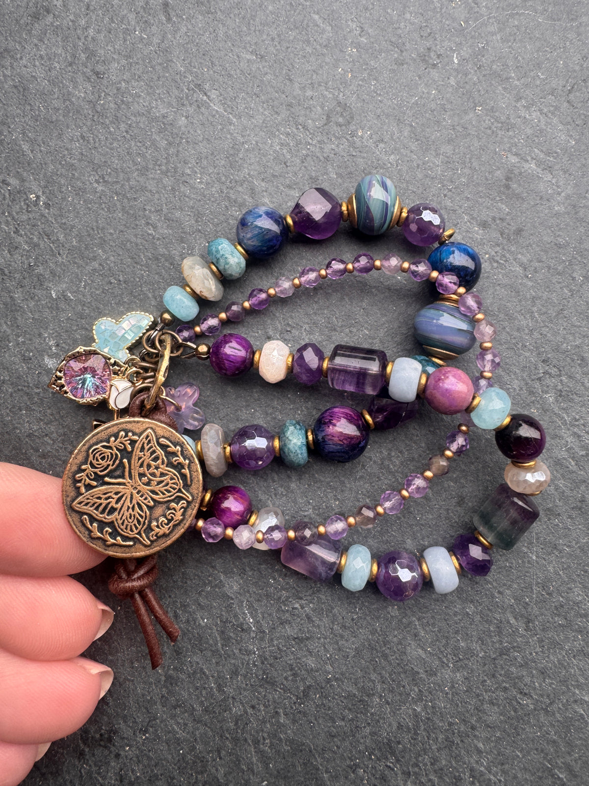 handmade lampwork glass, labradorite, fluorite, tigers eye, amethyst, aquamarine, moonstone, apatite, and  handmade butterfly button clasp.
