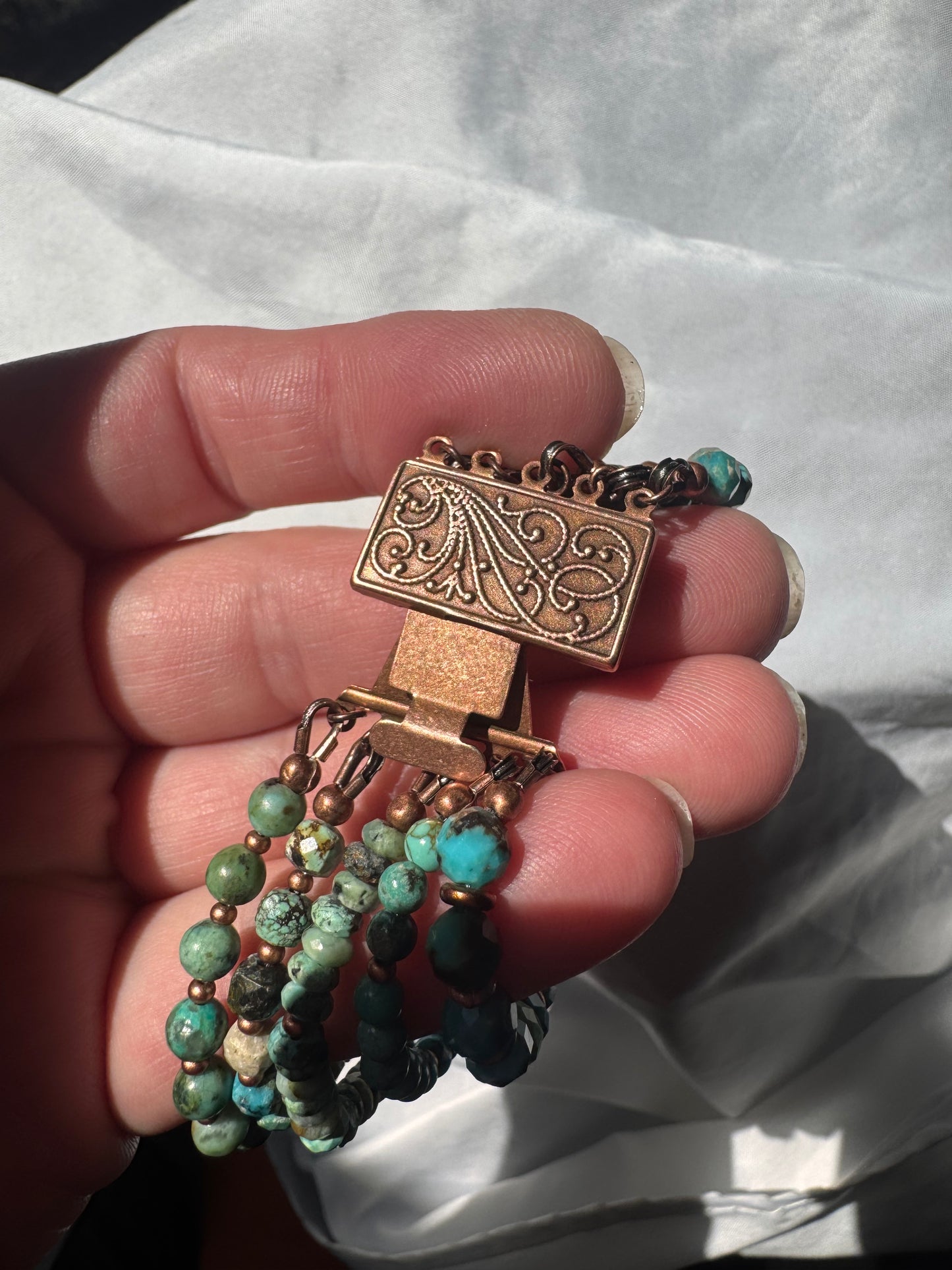 Turquoise and copper metal, multi strand, bracelet. MTO.