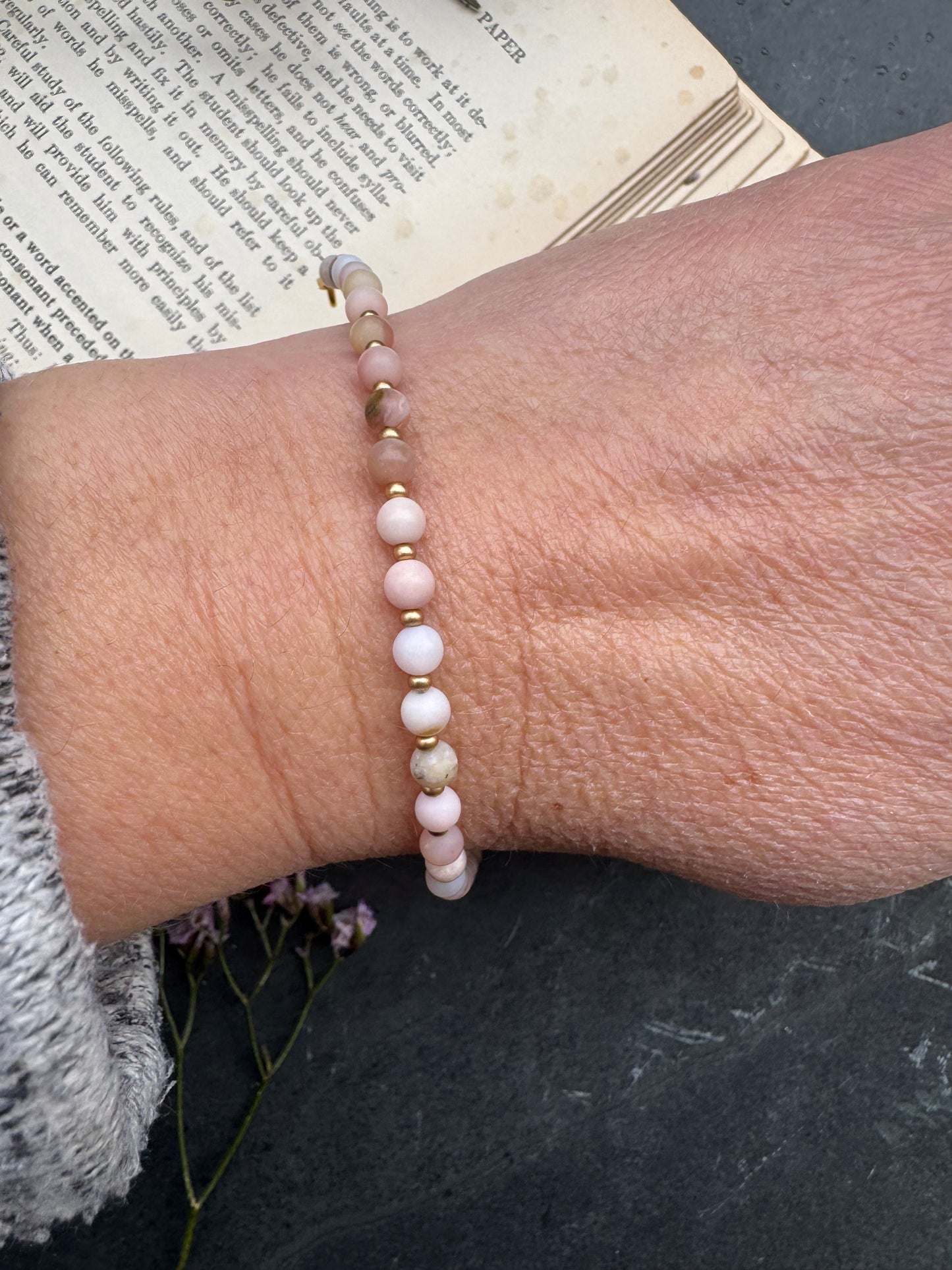 Pink opal round stone, gold metal, bracelet