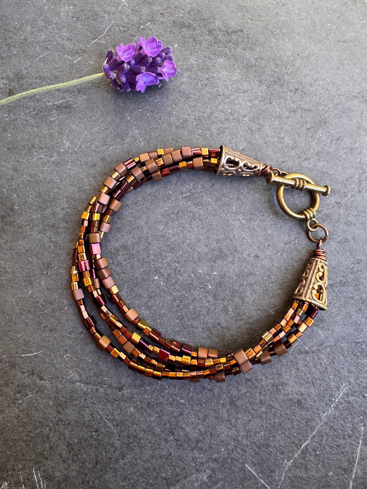 Brown Czech glass seed bead and bronze metal, bracelet.