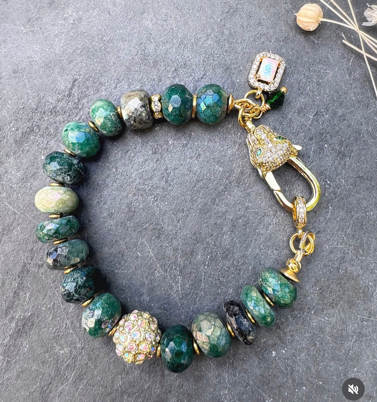 Emerald faceted stone-AB coating, jaguar gold rhinestone clasp.