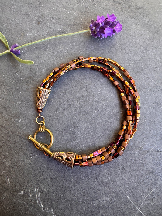 Brown Czech glass seed bead and bronze metal, bracelet.