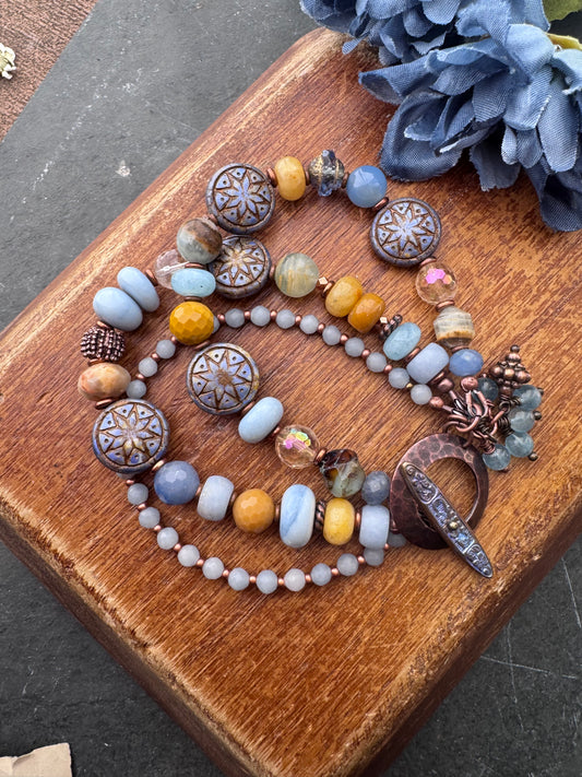 Blue opal, yellow jasper, Czech glass, citrine, agate, blue aventurine, Aquatine Lemurian Blue Calcite and copper metal.