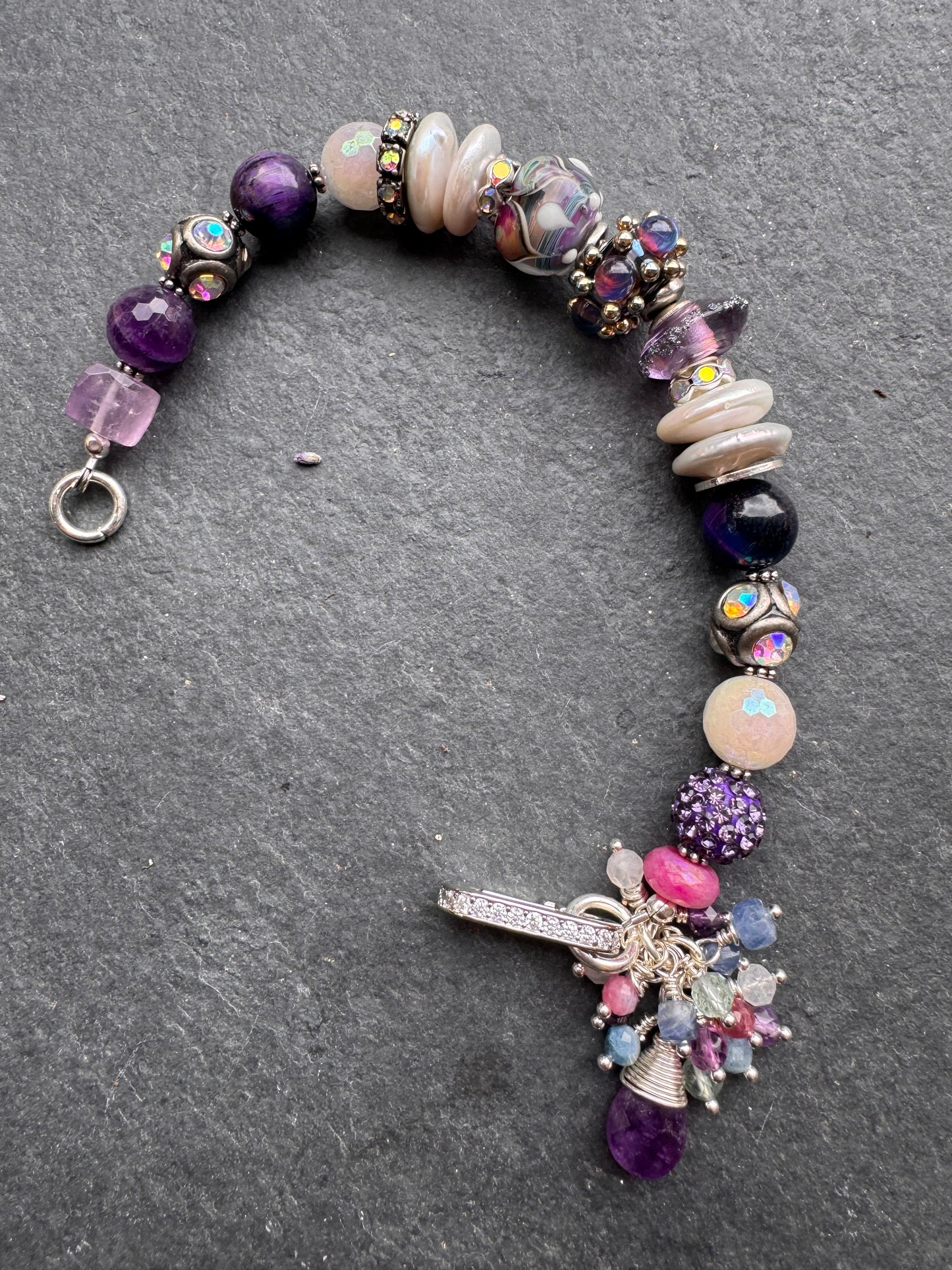 Cosmic. Handmade lampwork glass, cosmic tiger eye, pearls, rhinestones, moonstone, amethyst, silver metal, bracelet