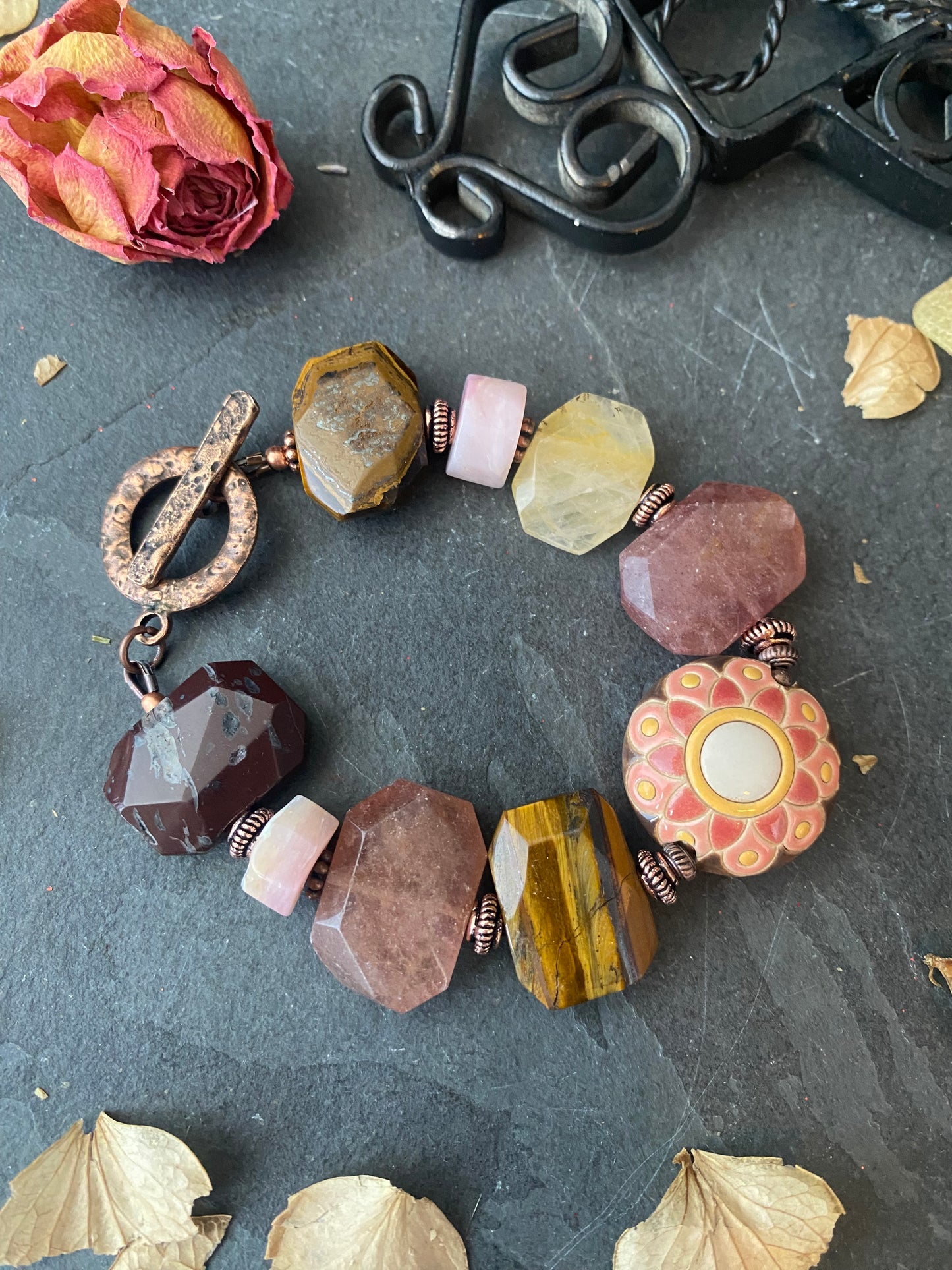 Flower ceramic focal bead, brown and pink with yellow stone, copper metal, bracelet