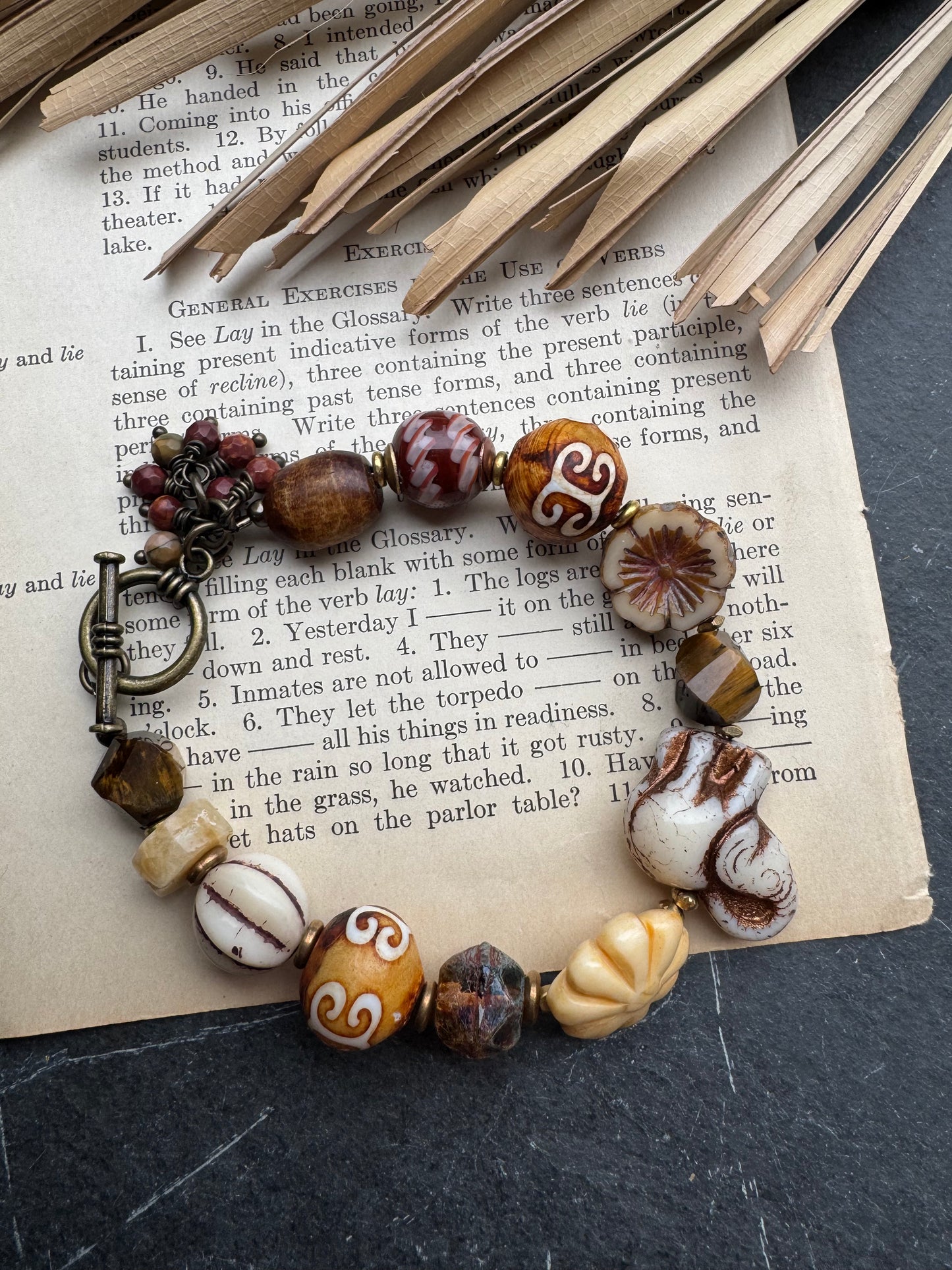 White Elephant. czech glass, African glass, Amazonite, wood, bone, tiger eye stone.