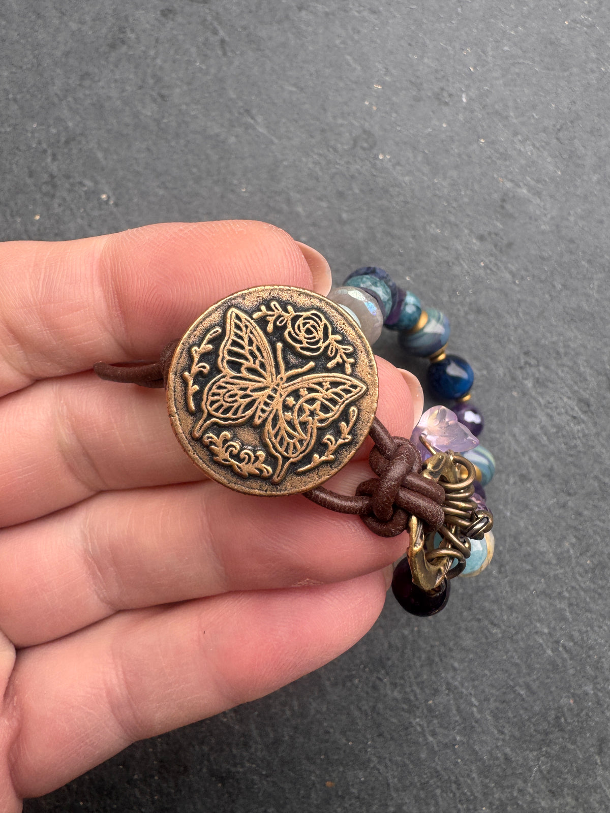 handmade lampwork glass, labradorite, fluorite, tigers eye, amethyst, aquamarine, moonstone, apatite, and  handmade butterfly button clasp.