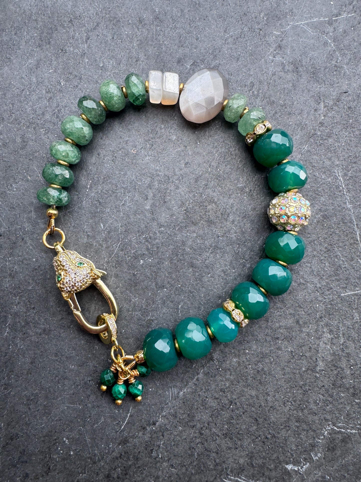 Green onyx faceted stone, green quartz, moonstone,jaguar gold rhinestone clasp.