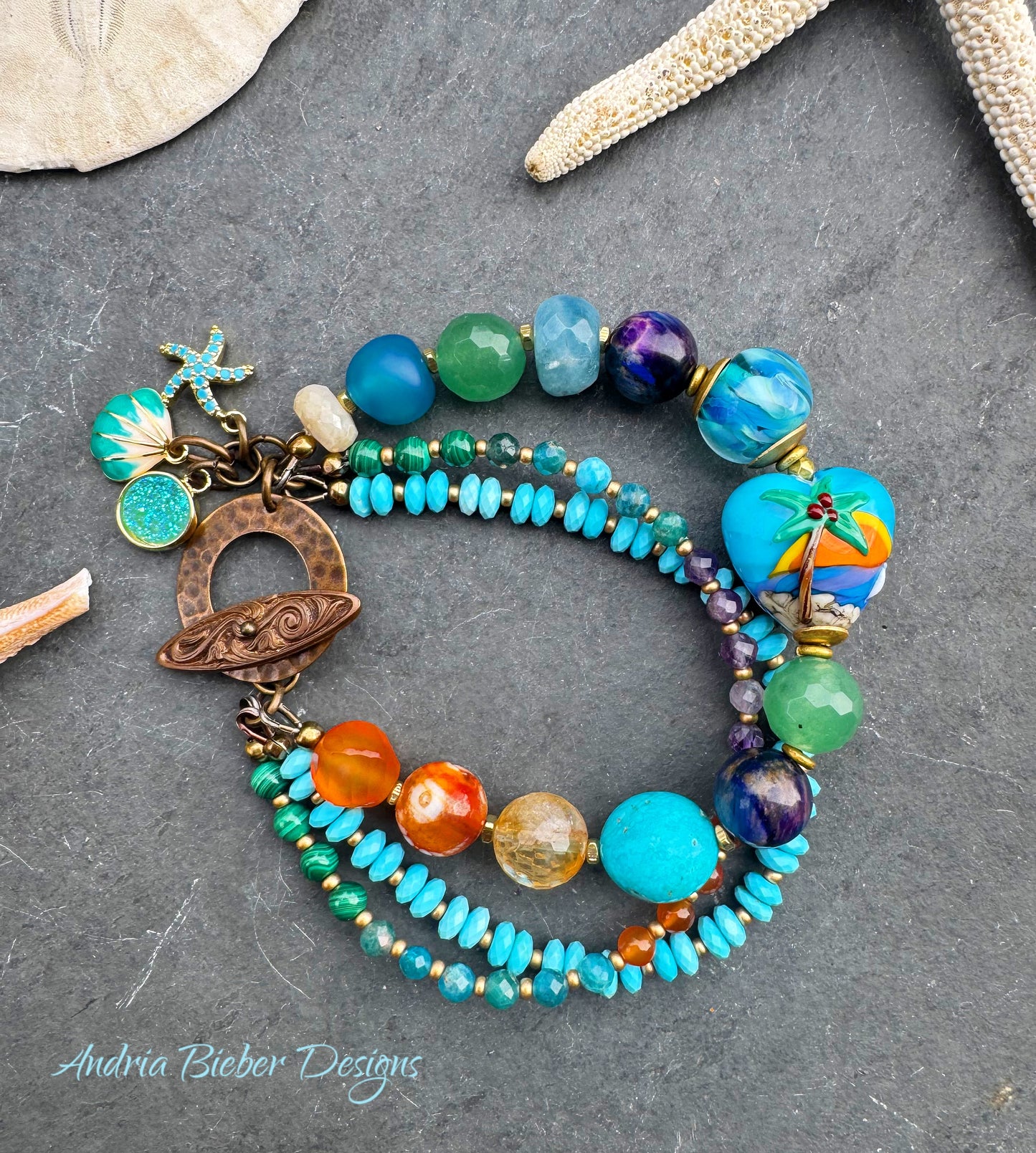 Beach. Mixed gemstone, lampwork glass, bronze metal.