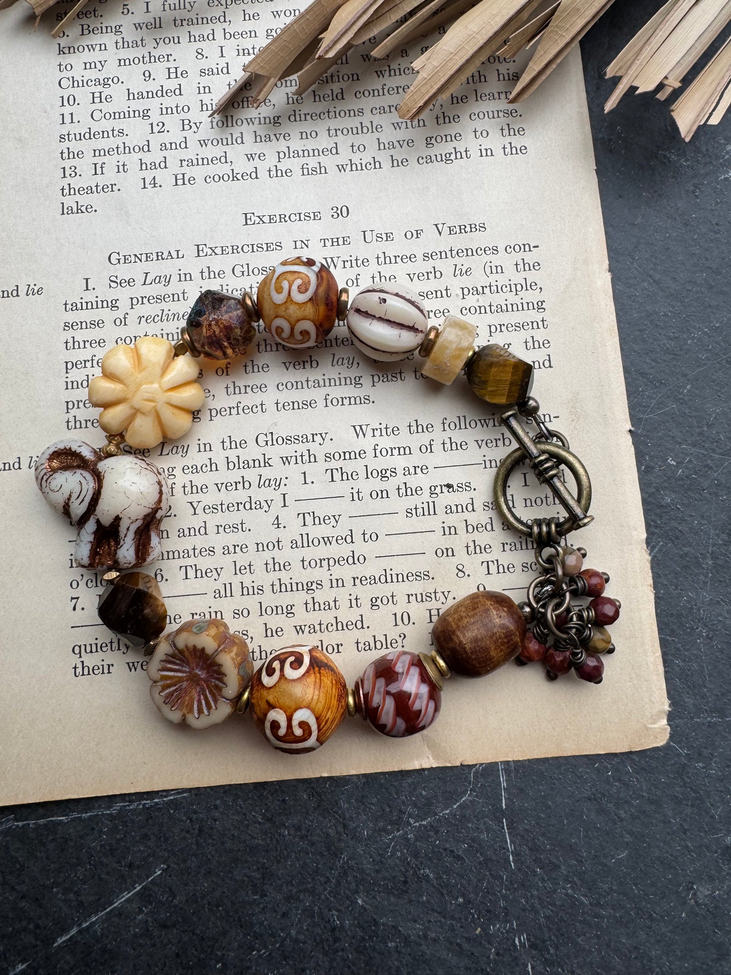 White Elephant. czech glass, African glass, Amazonite, wood, bone, tiger eye stone.