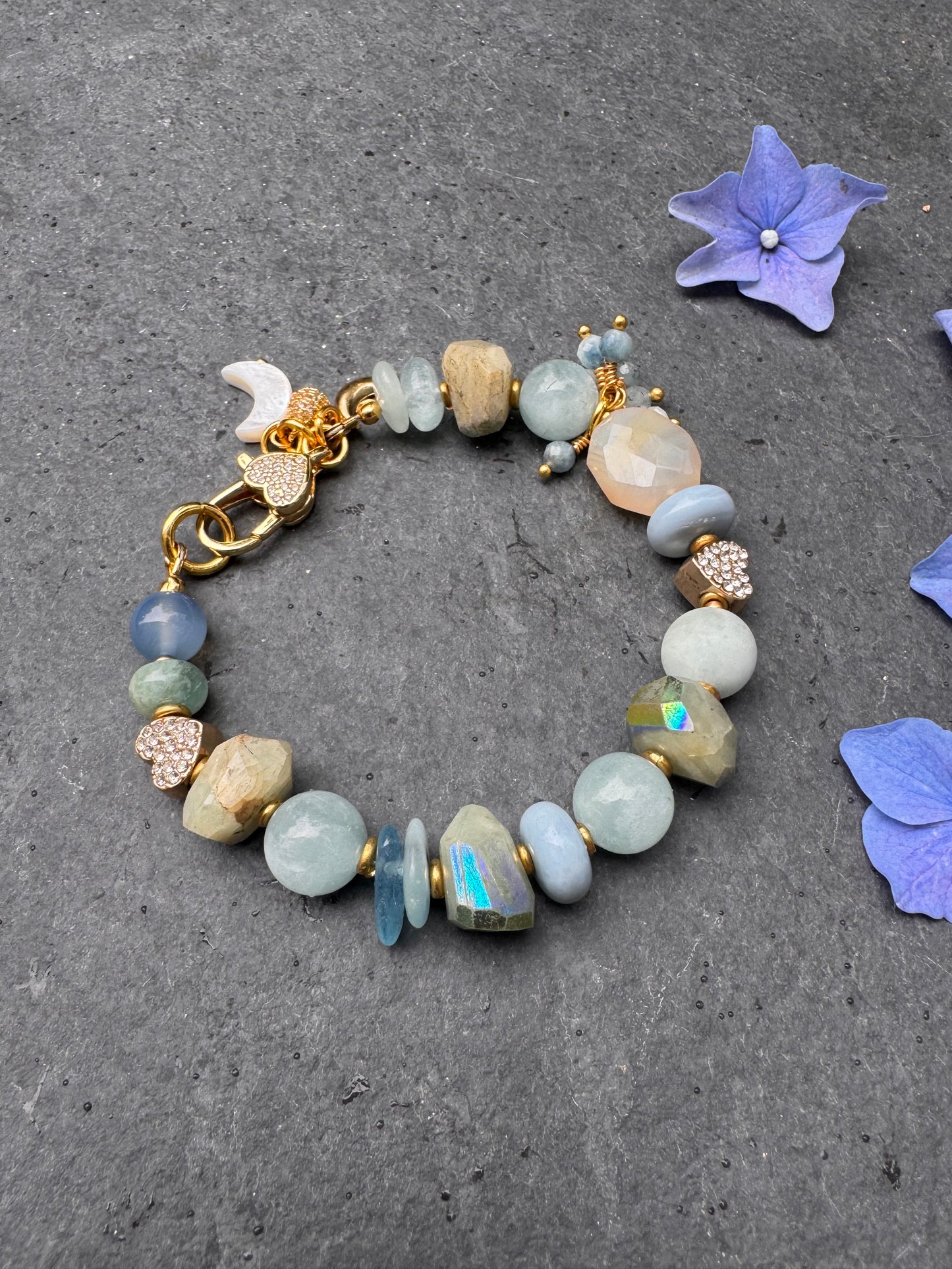 Blue hearts. Aquamarine, blue opal, AB faceted chalcedony, rhinestone, bracelet