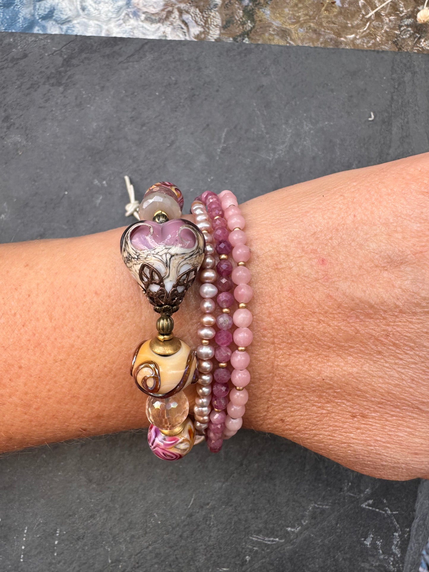 Pink opal, pink Tourmaline, moonstone mystic, strawberry quartz mystic, citrine mystic, pink pearls and handmade lamp work glass, bronze butterfly button, white leather.