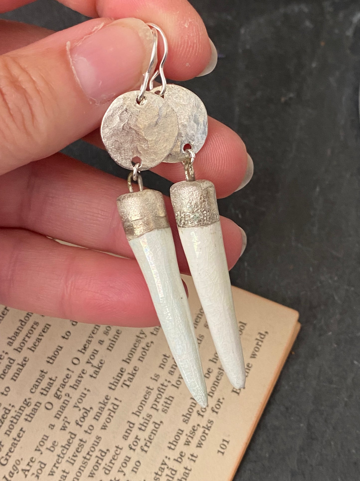 White and silver ceramic charms, silver metal, earrings.