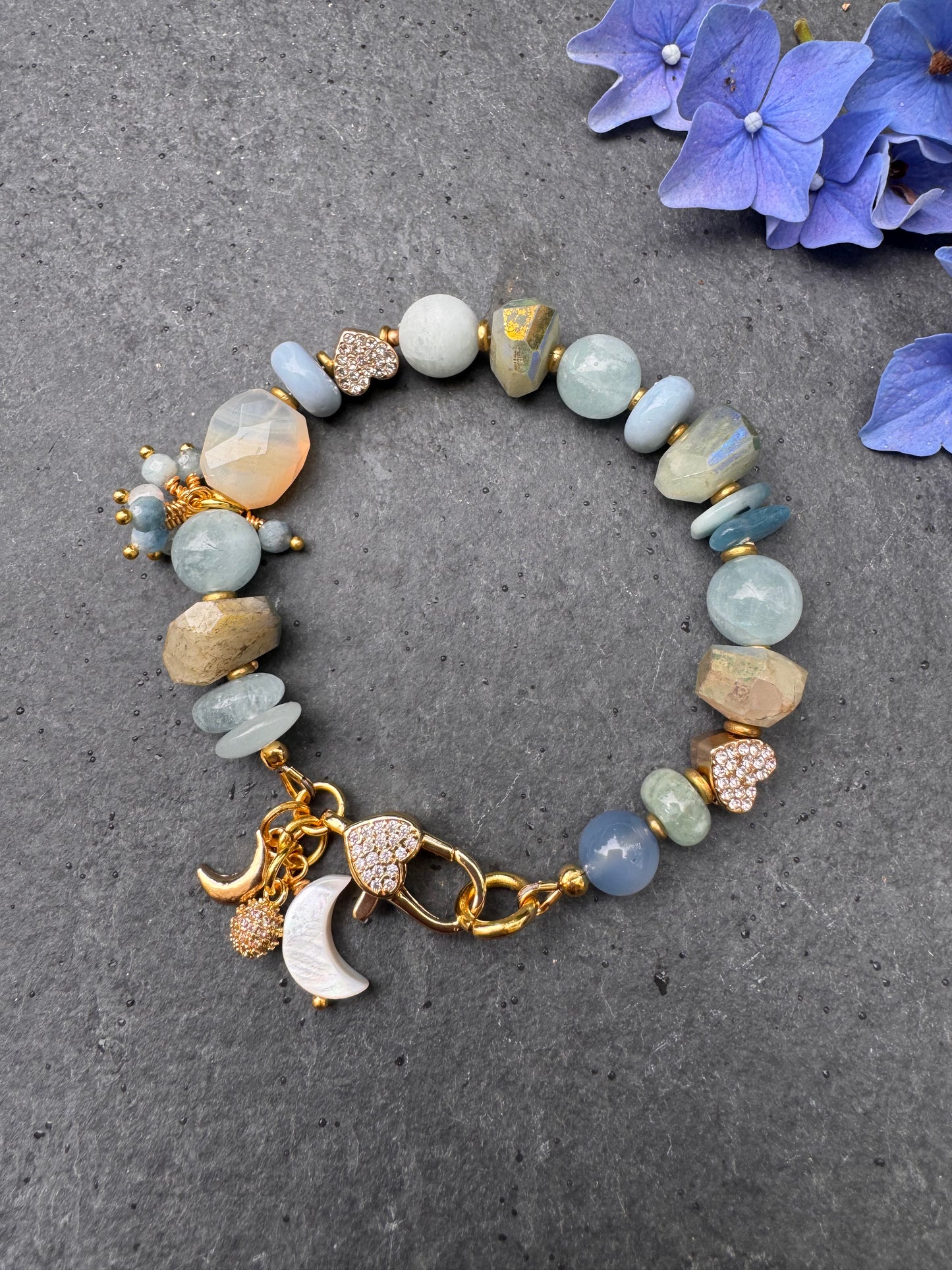 Blue hearts. Aquamarine, blue opal, AB faceted chalcedony, rhinestone, bracelet