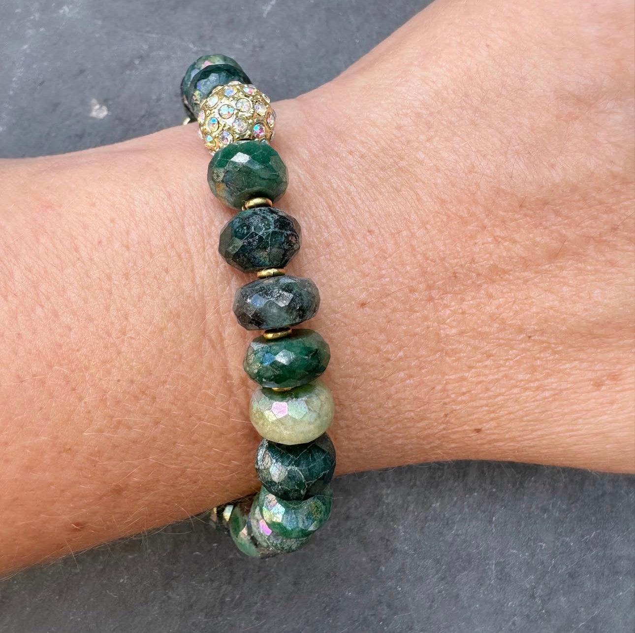 Emerald faceted stone-AB coating, jaguar gold rhinestone clasp.