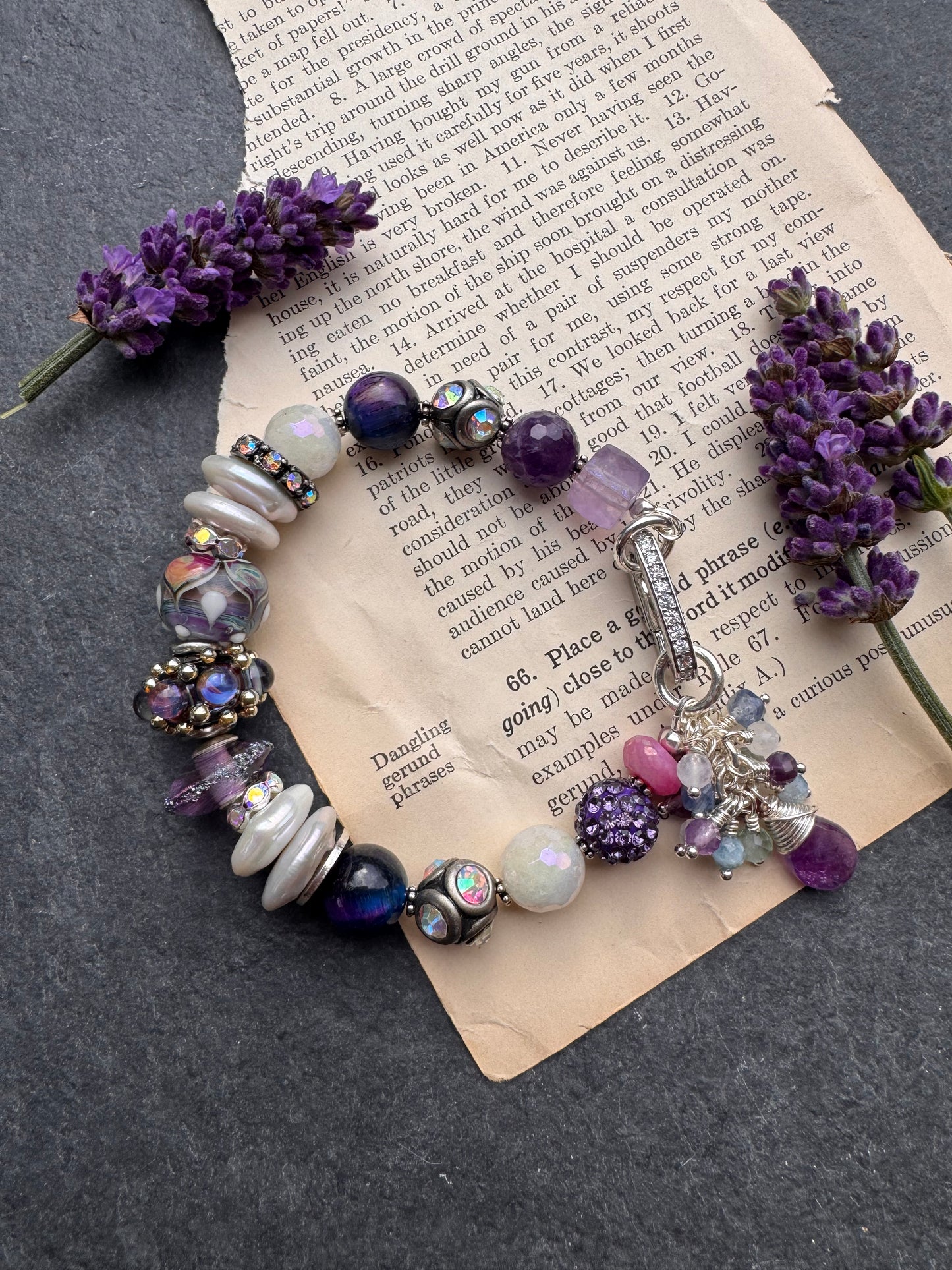 Cosmic. Handmade lampwork glass, cosmic tiger eye, pearls, rhinestones, moonstone, amethyst, silver metal, bracelet