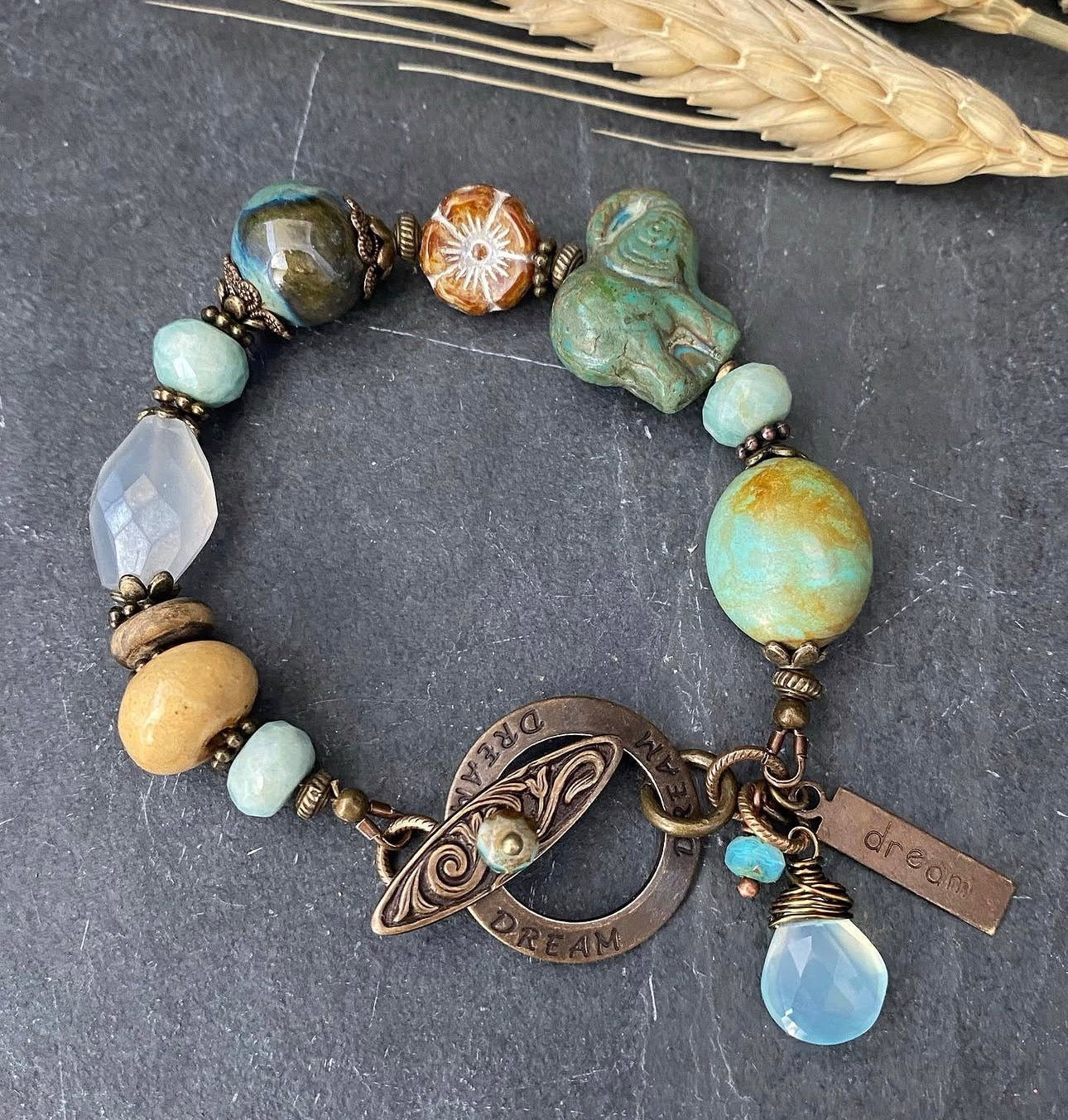 Turquoise, chalcedony, ceramic, Czech glass, Vintaj brass bracelet.