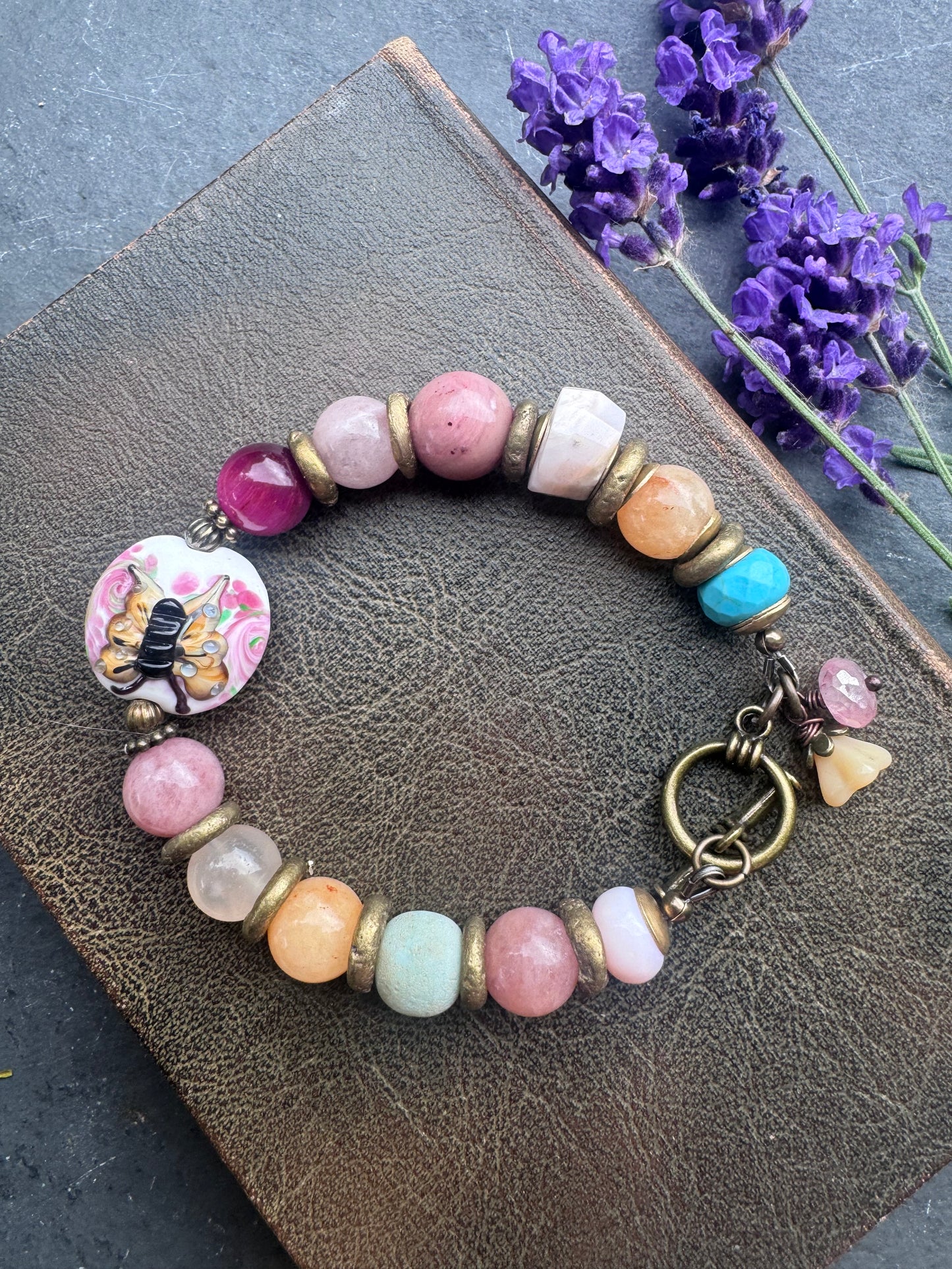 Mixed stone, glass, brass metal, bracelet.