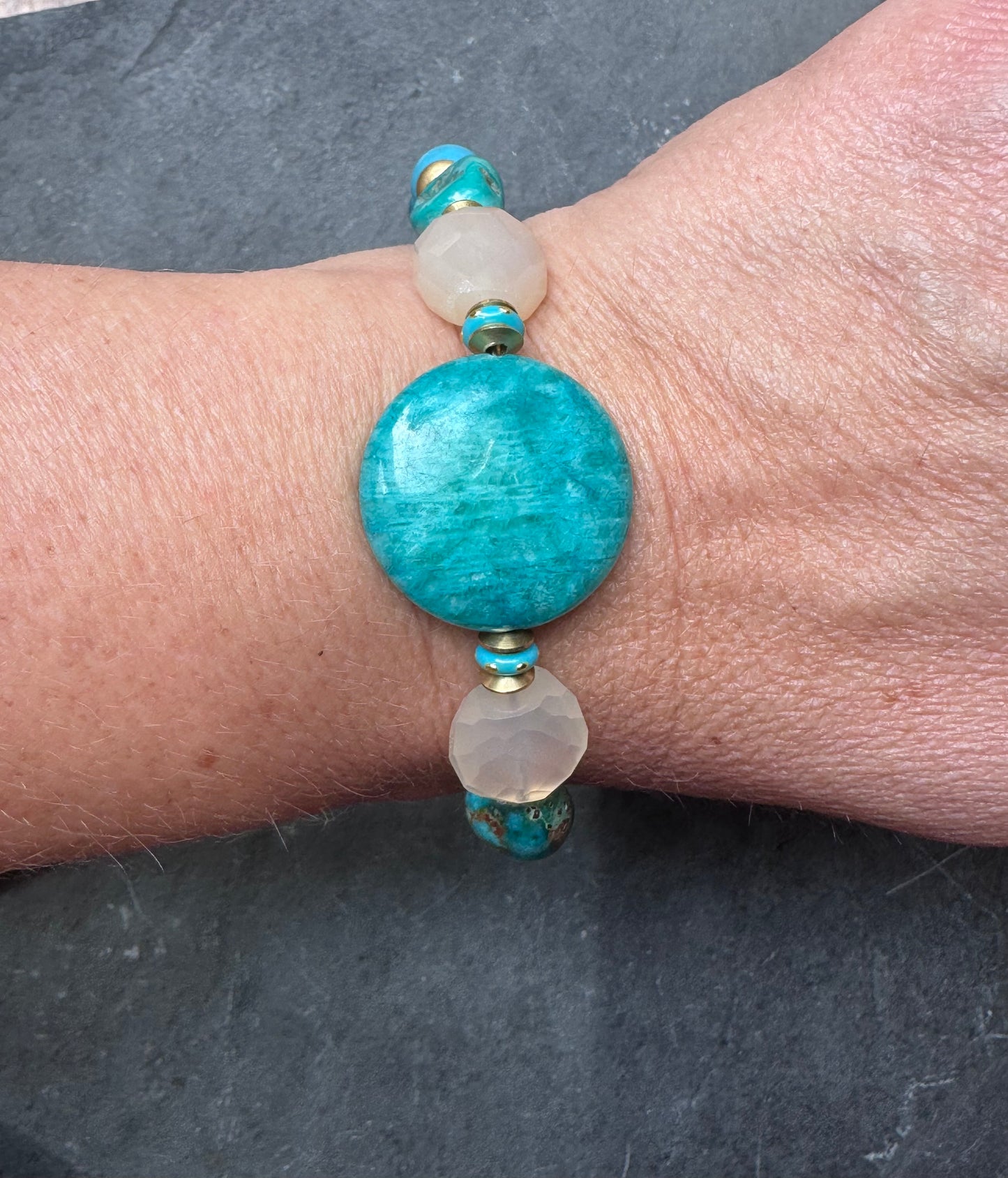 Turquoise, chalcedony, ceramic rounds, apatite stone and African brass bracelet.