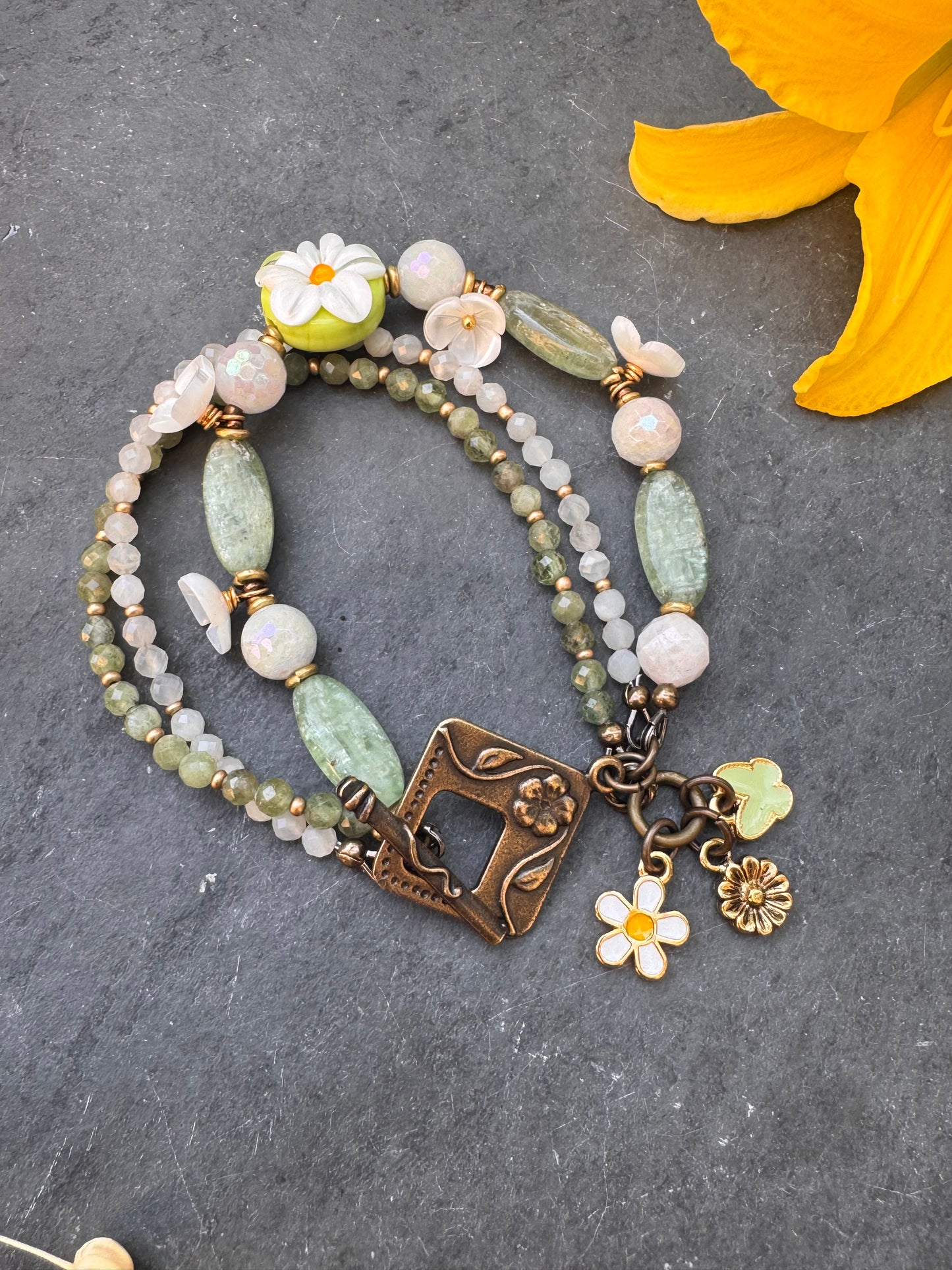 White daisy. Handmade lampwork glass, shell flowers, kyanite, moonstone, bronze metal, bracelet