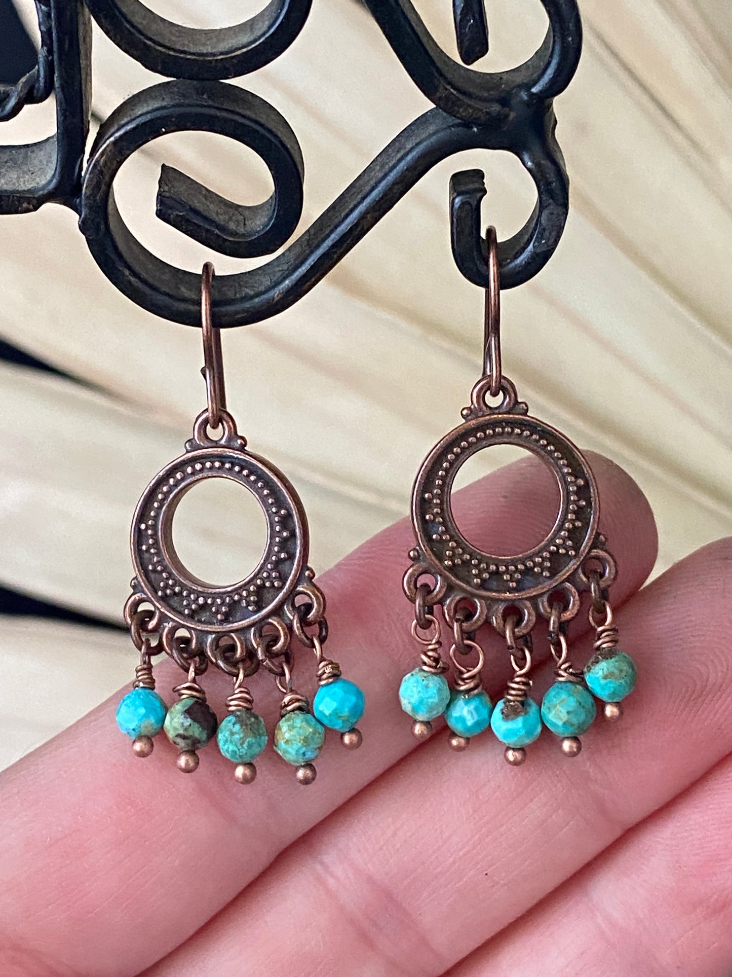 Turquoise stone, copper metal charm, earrings, jewelry.