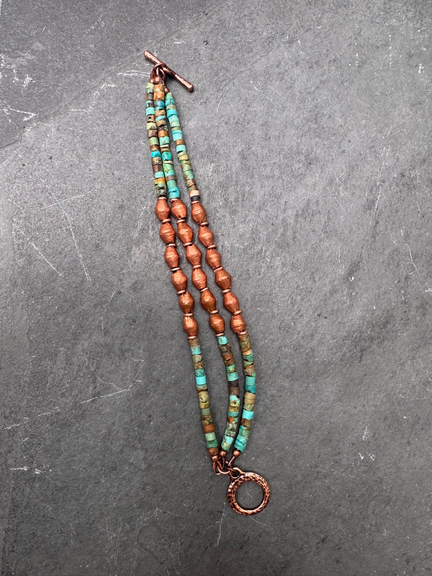 Turquoise stone, copper metal, multi strand, bracelet