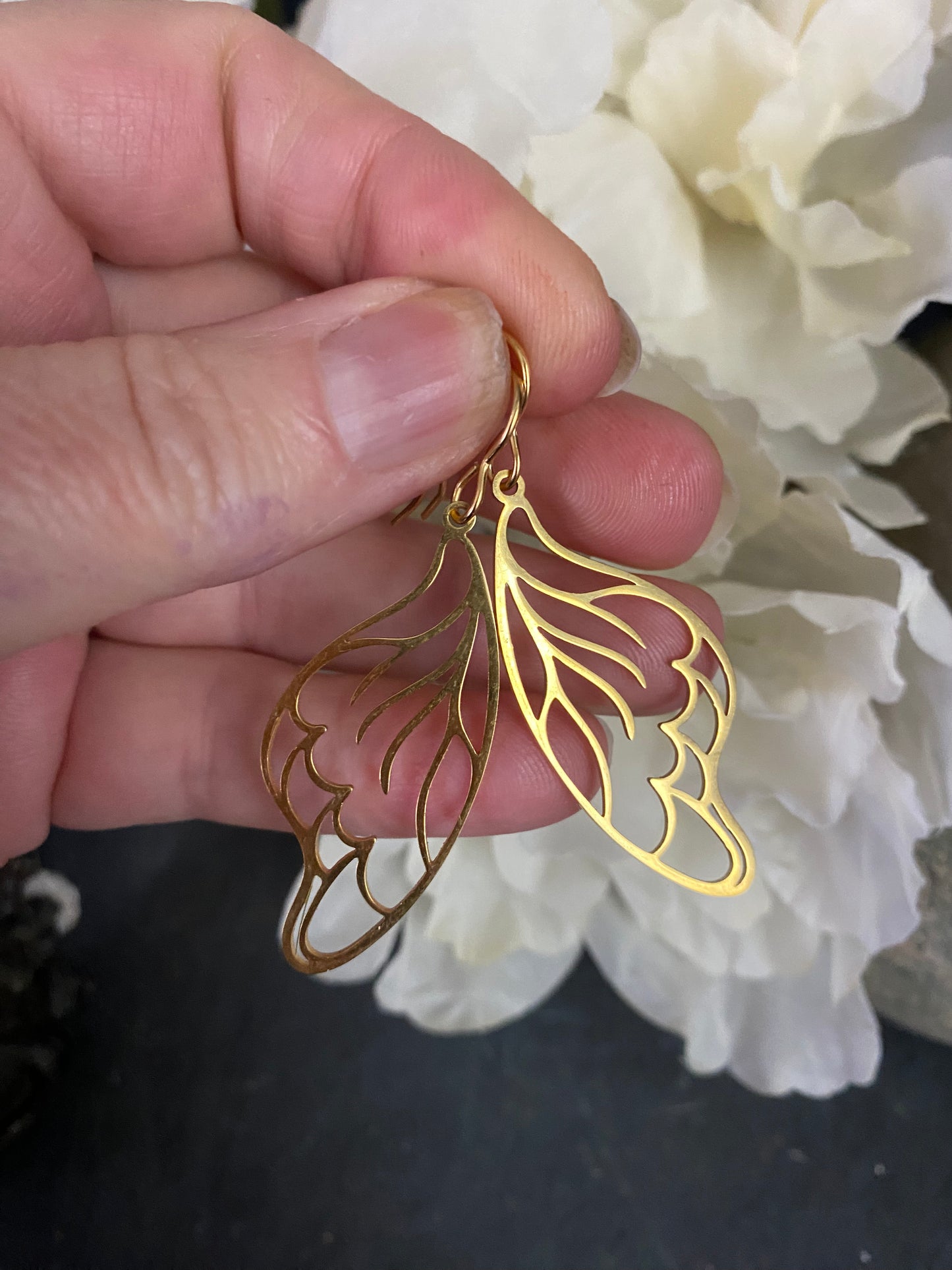 Gold butterfly wing charm earrings