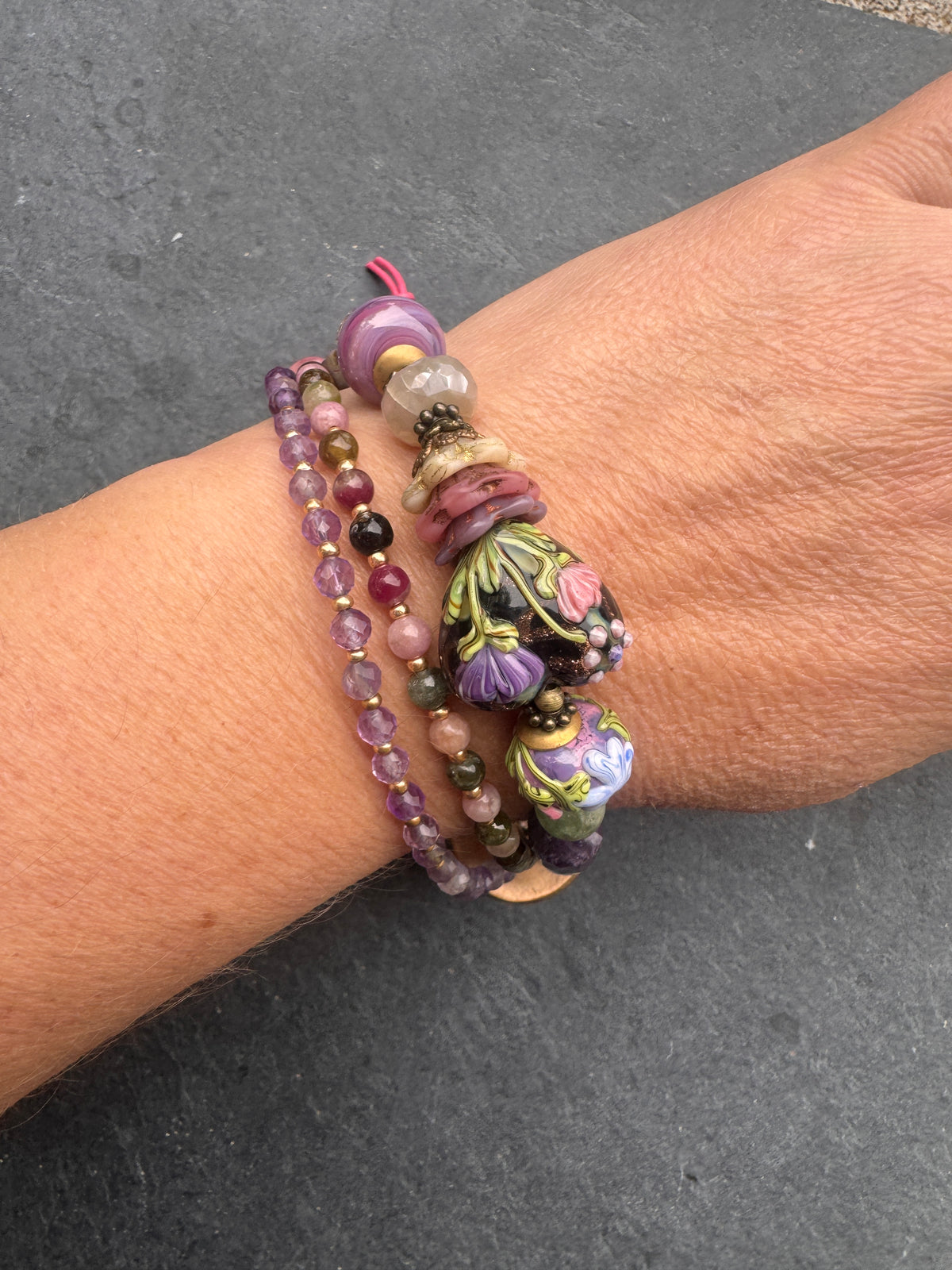 handmade lampwork glass, amethyst, tourmaline, moonstone, Madagascar rose quartz, pink tourmaline and handmade dandy lion button clasp.