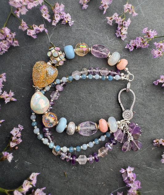 handmade lampwork glass, baroque pearl, blue opal, citrine with AB, moonstone, labradorite, pink opal, amethyst, and kyanite. Rhinestone clasp. Bracelet.