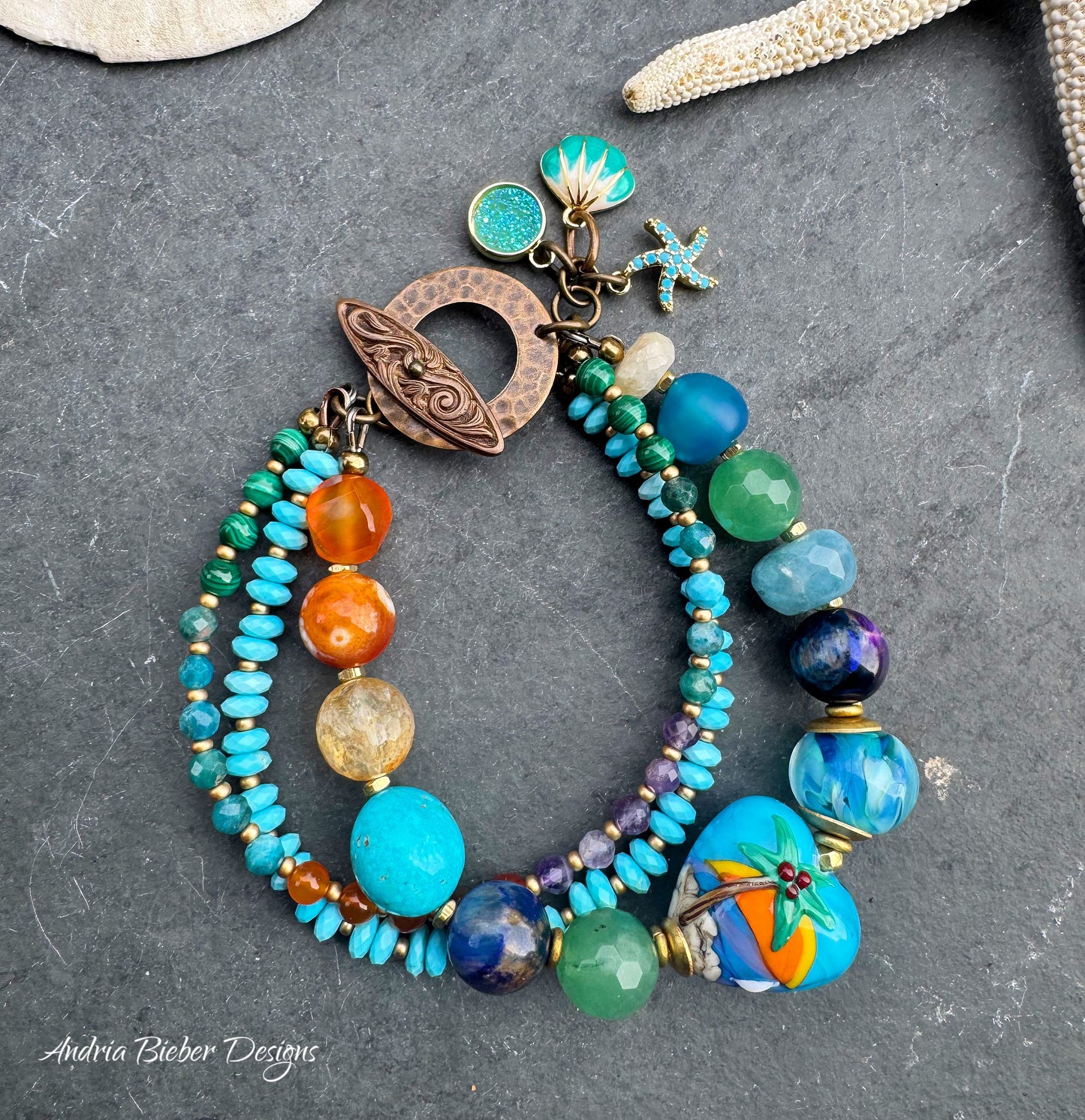 Beach. Mixed gemstone, lampwork glass, bronze metal.