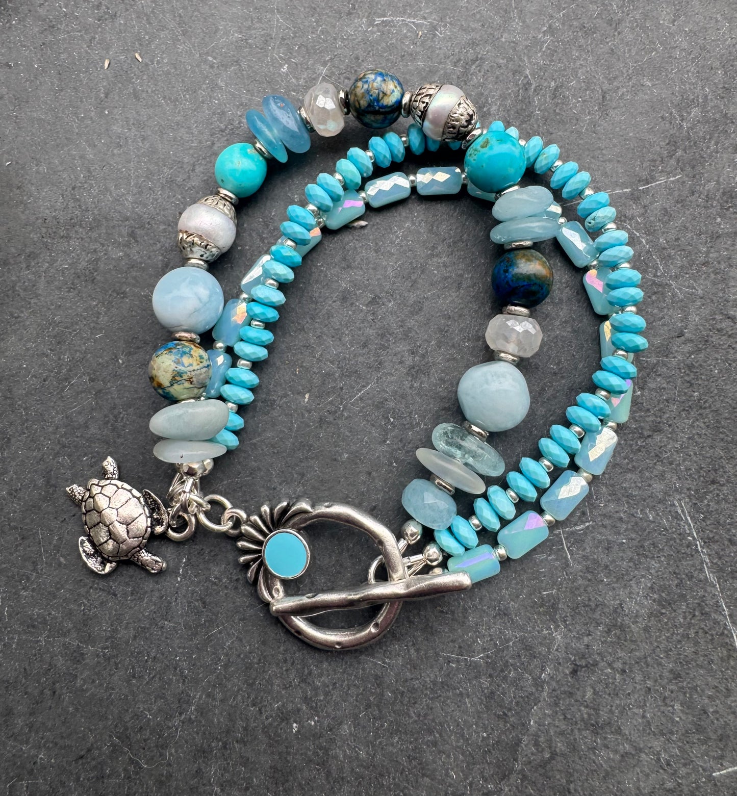 Turquoise, aquamarine, moonstone, pearl, glass, silver metal, bracelet.