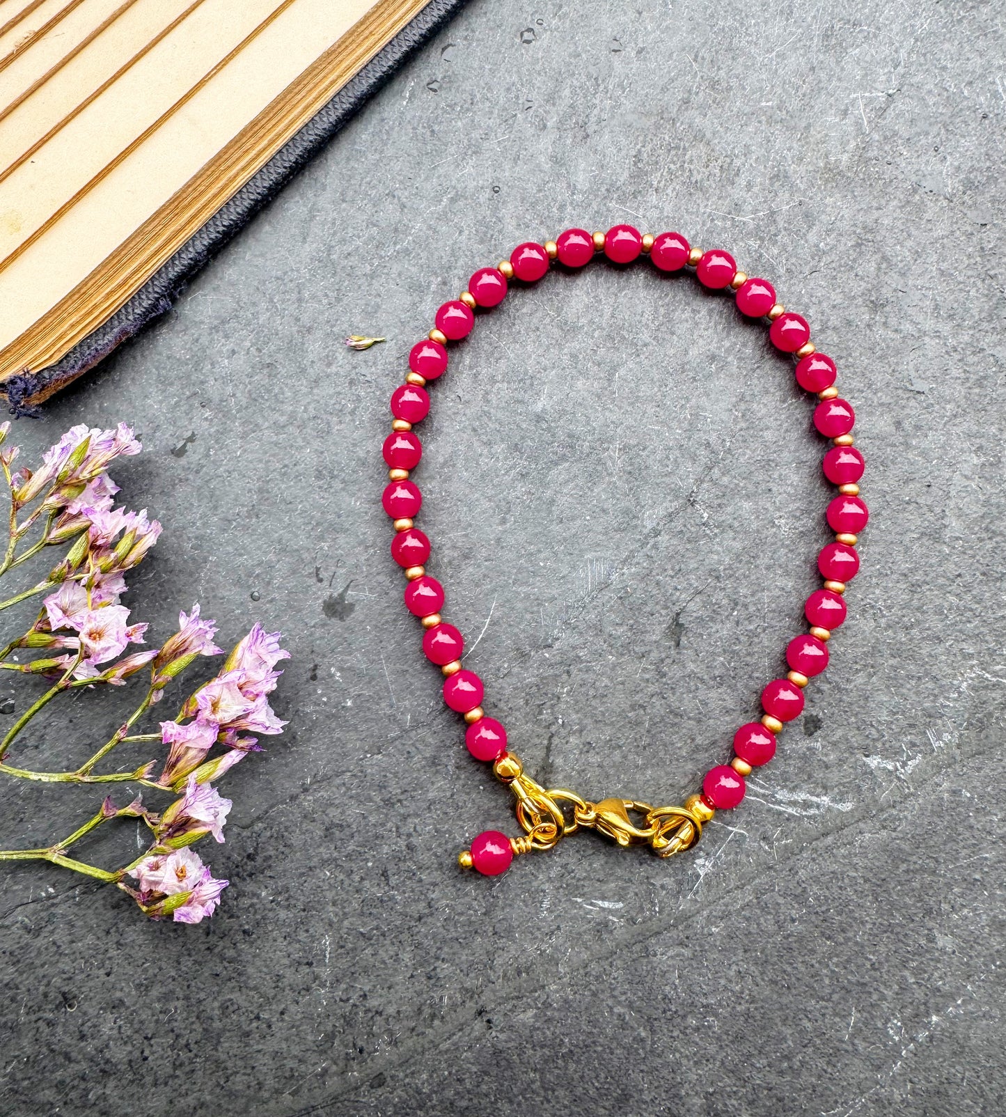 Ruby round stone, gold metal, bracelet
