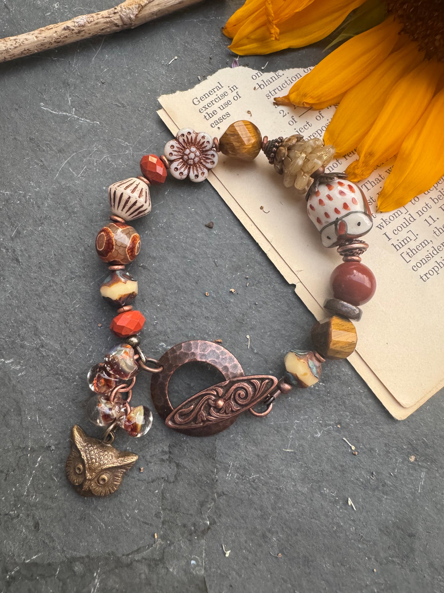 Tiger eye, jasper, agate, czech glass, lampwork glass, ceramic, copper metal. Owl theme.