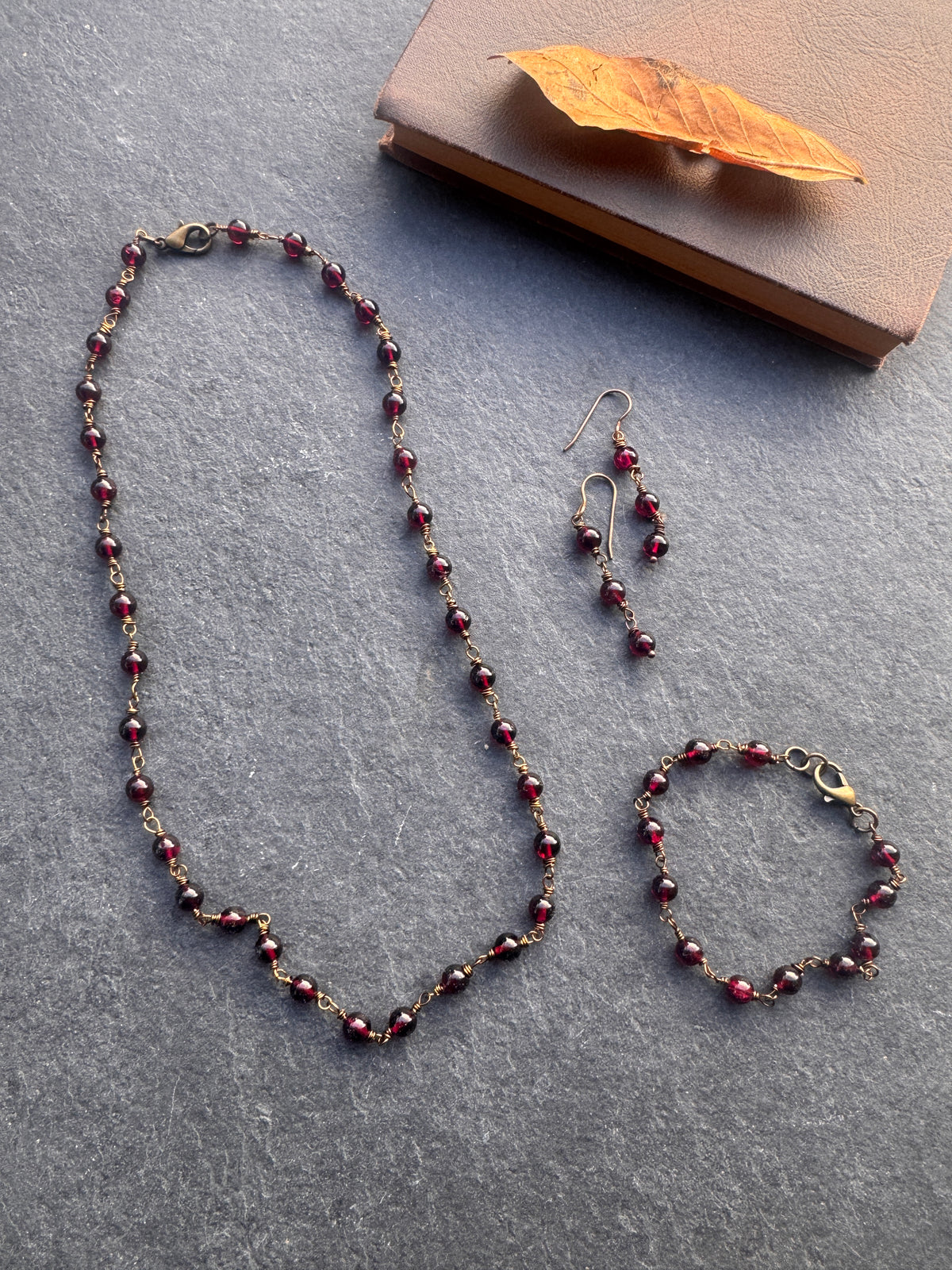 Garnet wire wrapped chain, antique brass metal, necklace, earrings, and bracelet set ￼