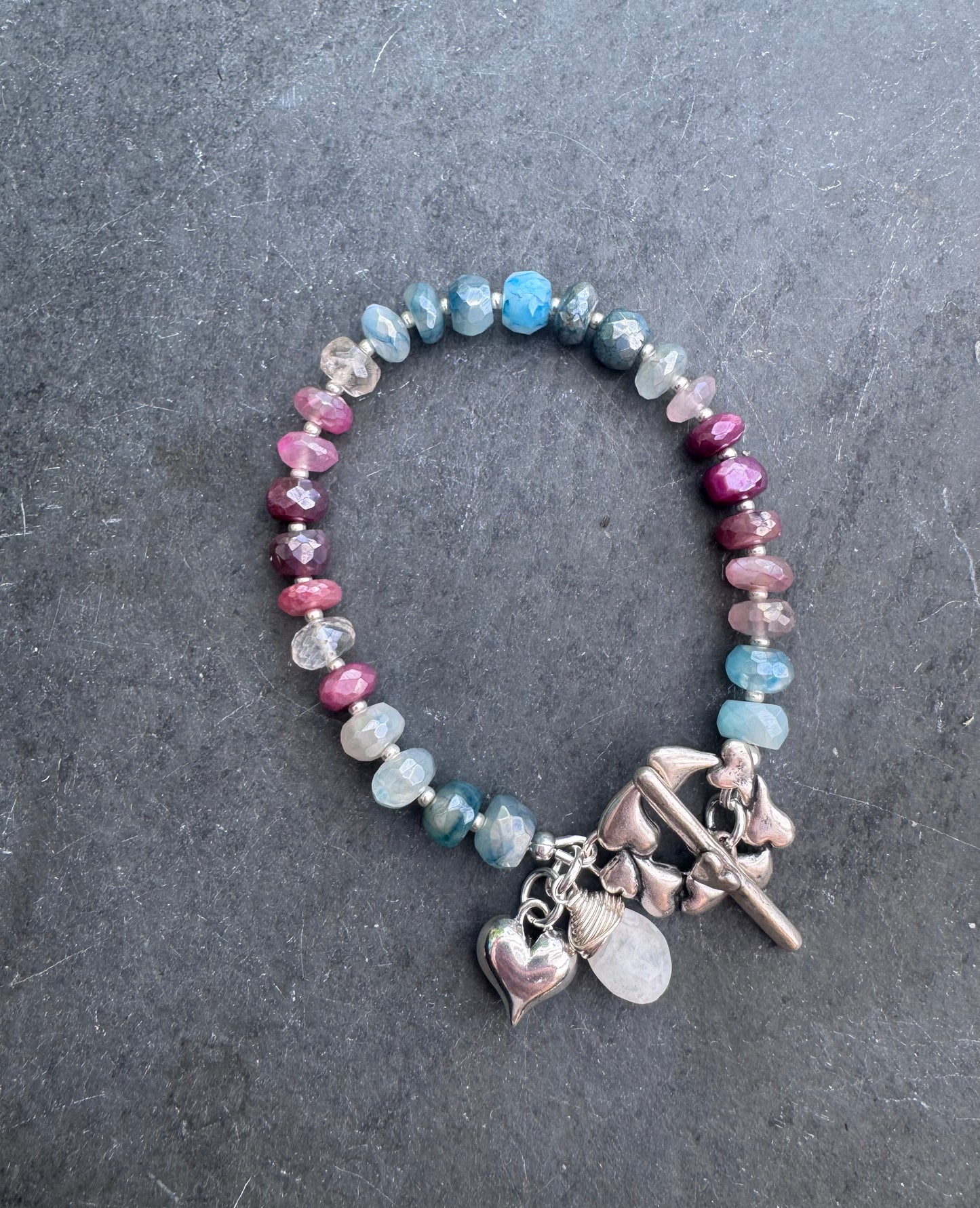 Charm, blue and pink moonstone bracelet. Silver metal bracelet.