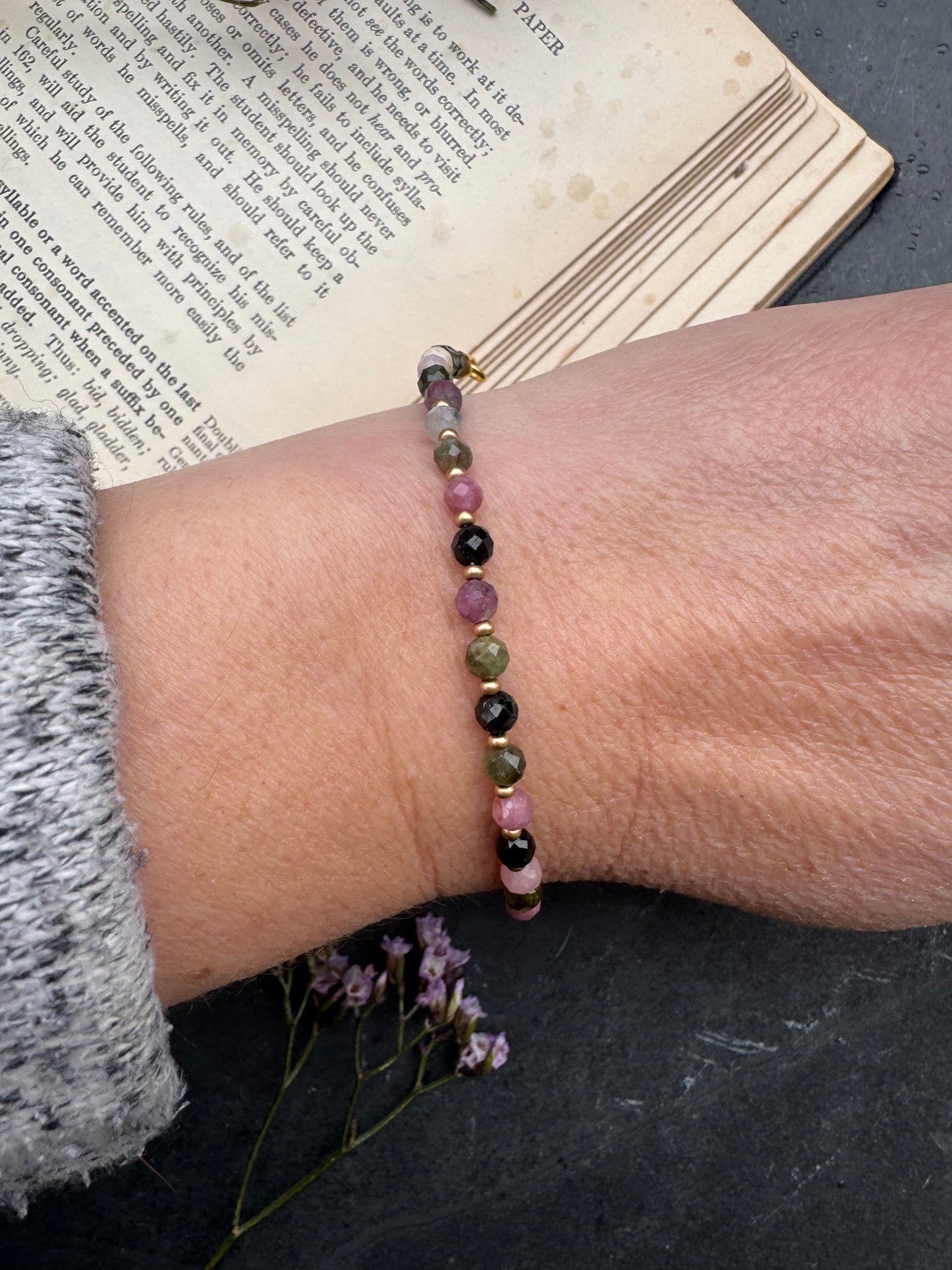 Watermelon tourmaline faceted round stone, gold metal, bracelet